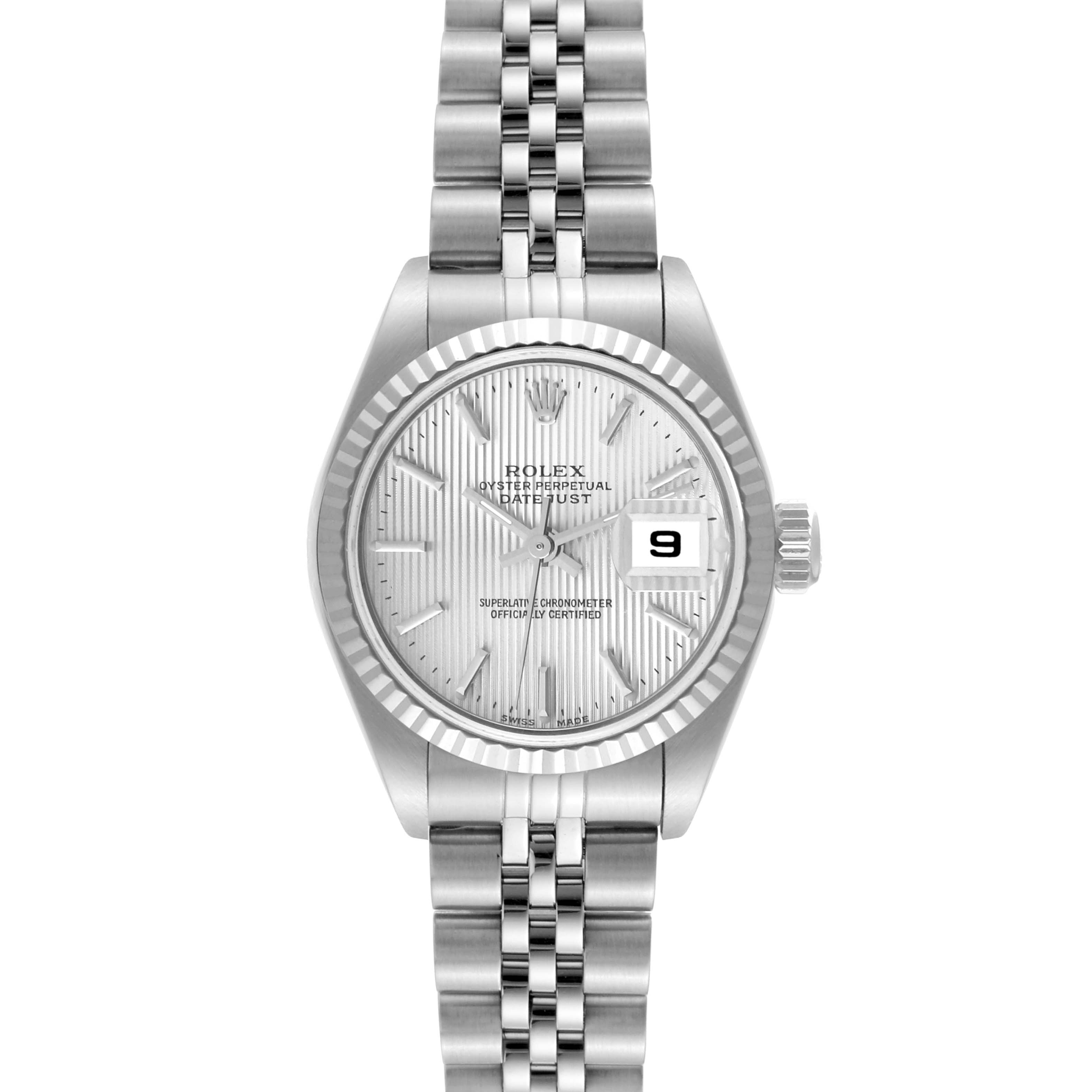 The image shows a front view of a Rolex Datejust 79174 Women
s Stainless Steel Silver Dial 79174 Women
s Stainless Steel Silver Dial watch, showcasing its dial, bezel, and part of the bracelet.