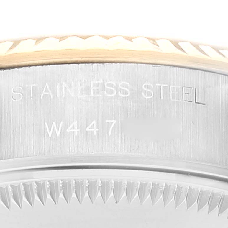 This close-up image shows the stainless steel case back with engraved text of a Rolex Datejust 69173 Women
s Steel and Gold (two tone) Champagne Dial 69173 Women
s Steel and Gold (two tone) Champagne Dial watch.
