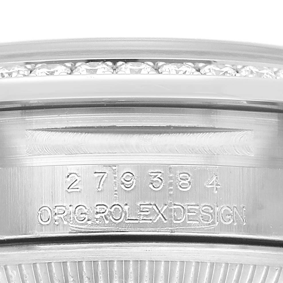 The image shows the side profile of a Rolex Datejust 279384 Women's Stainless Steel White Dial, focusing on the engraved model/design number and part of the bezel.