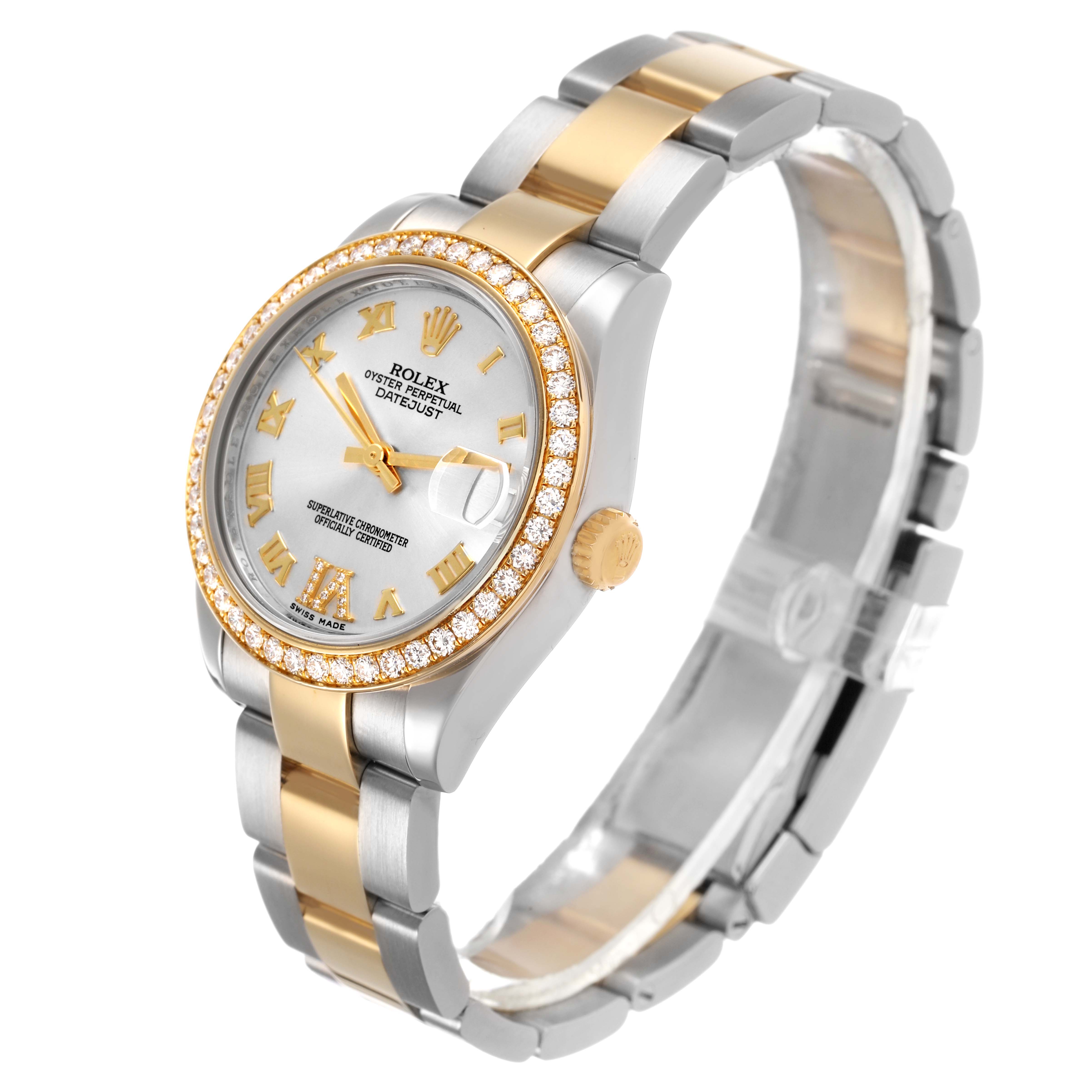 The Rolex Mid-Size 178383 Women's Steel and Gold (two tone) Silver Dial watch is shown at an angle, highlighting the face, bezel, crown, and two-tone bracelet.