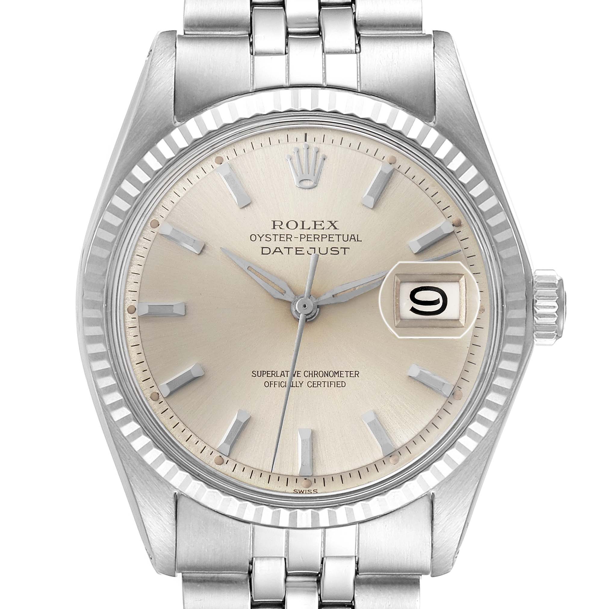 The Rolex Datejust 1601 Men
s Stainless Steel Silver Dial 1601 Men
s Stainless Steel Silver Dial watch is shown from a front view, displaying the dial, fluted bezel, and part of the bracelet.
