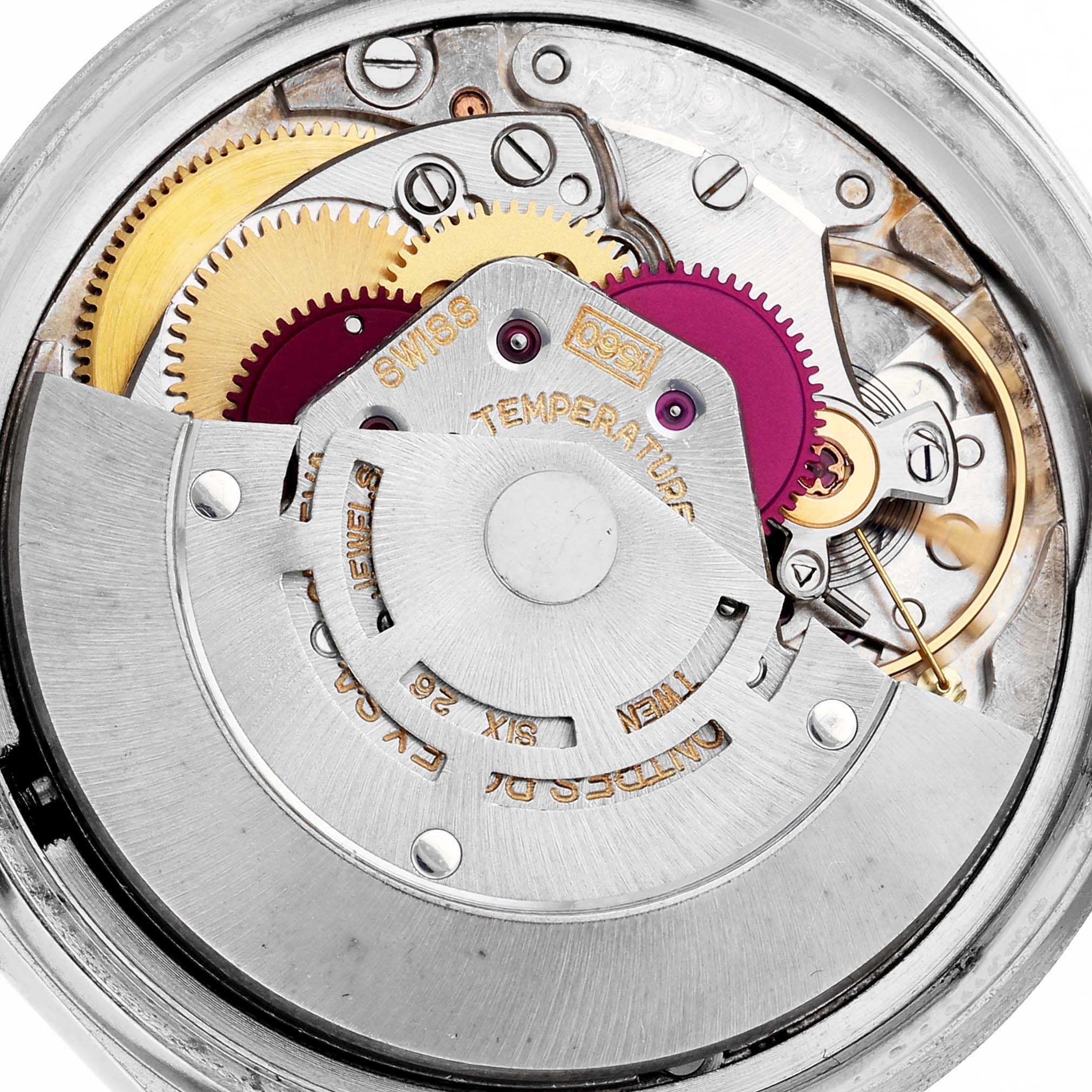 The image shows a close-up view of the Rolex Datejust 1601 Men
s Stainless Steel Silver Dial 1601 Men
s Stainless Steel Silver Dial
s movement, highlighting gears and mechanisms.