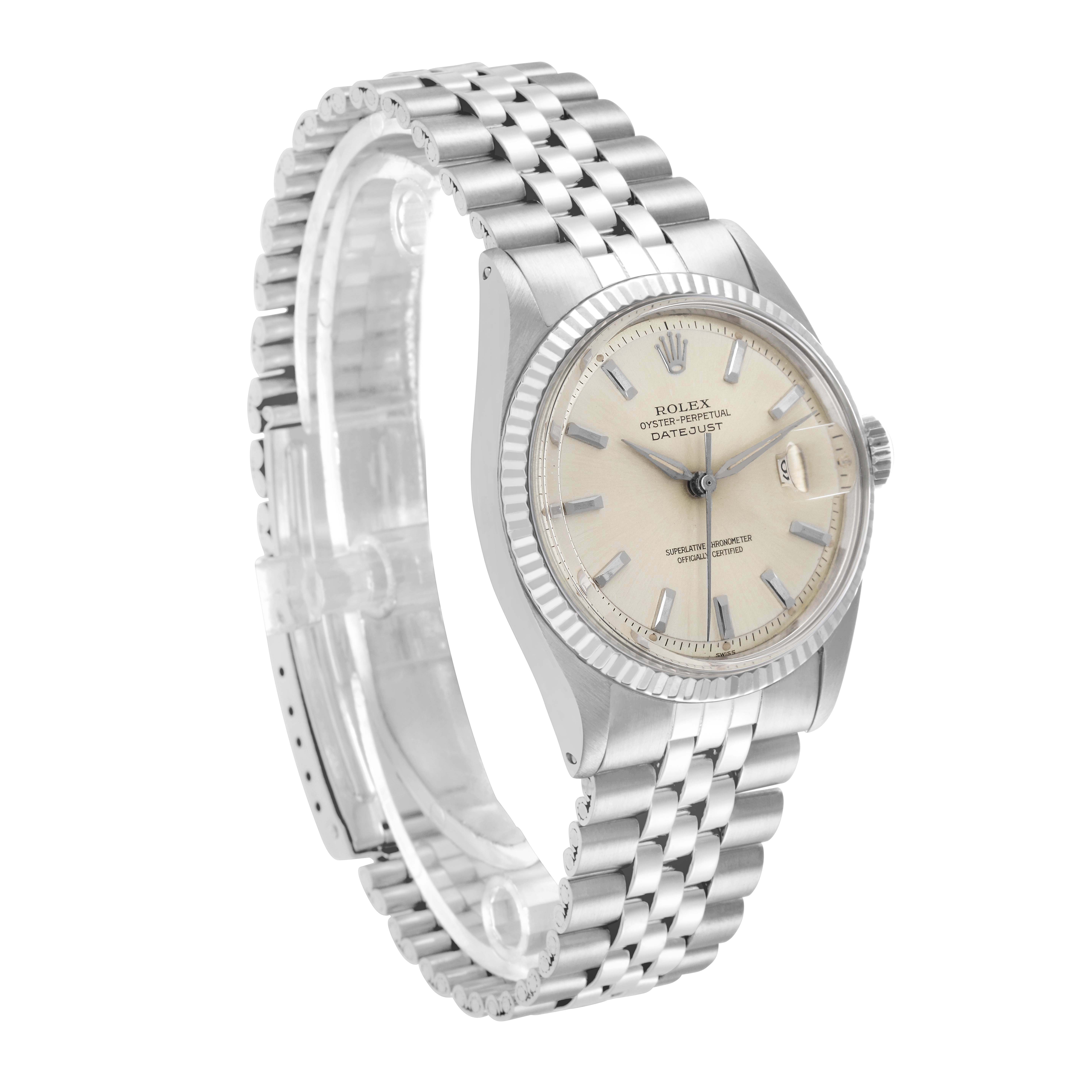 The Rolex Datejust 1601 Men
s Stainless Steel Silver Dial 1601 Men
s Stainless Steel Silver Dial watch is shown at an angle highlighting the face, bezel, crown, and jubilee bracelet.