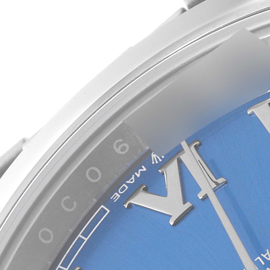 The image shows a close-up of the Rolex Datejust 41 126300 Men's Stainless Steel Blue Dial 126300 Men's Stainless Steel Blue Dial's blue dial with Roman numerals and part of the bezel.