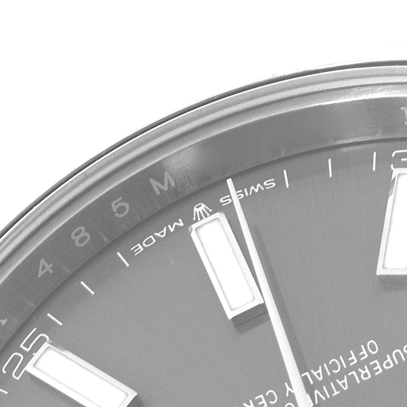 This image shows the dial of the Rolex Datejust 41 126300 Men's Stainless Steel Grey Dial 126300 Men's Stainless Steel Grey Dial, focusing on the hour markers and part of the "Swiss Made" text.