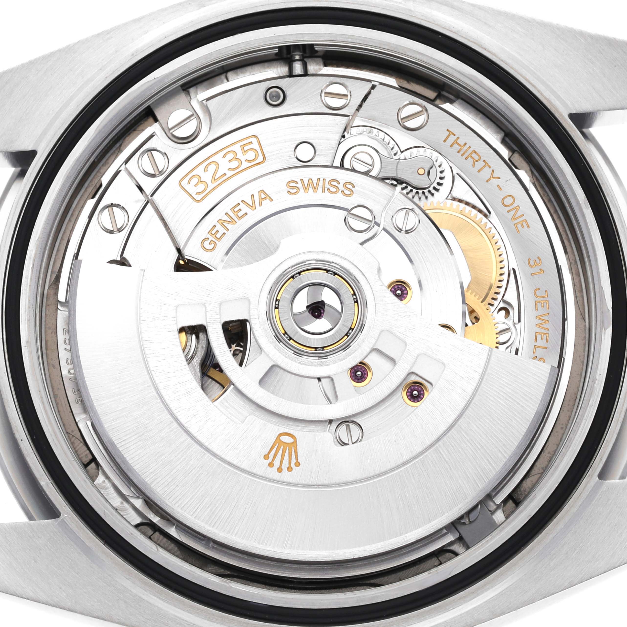 The image shows the movement mechanism of a Rolex Datejust 41 126300 Men
s Stainless Steel Grey Dial 126300 Men
s Stainless Steel Grey Dial watch from a back view.