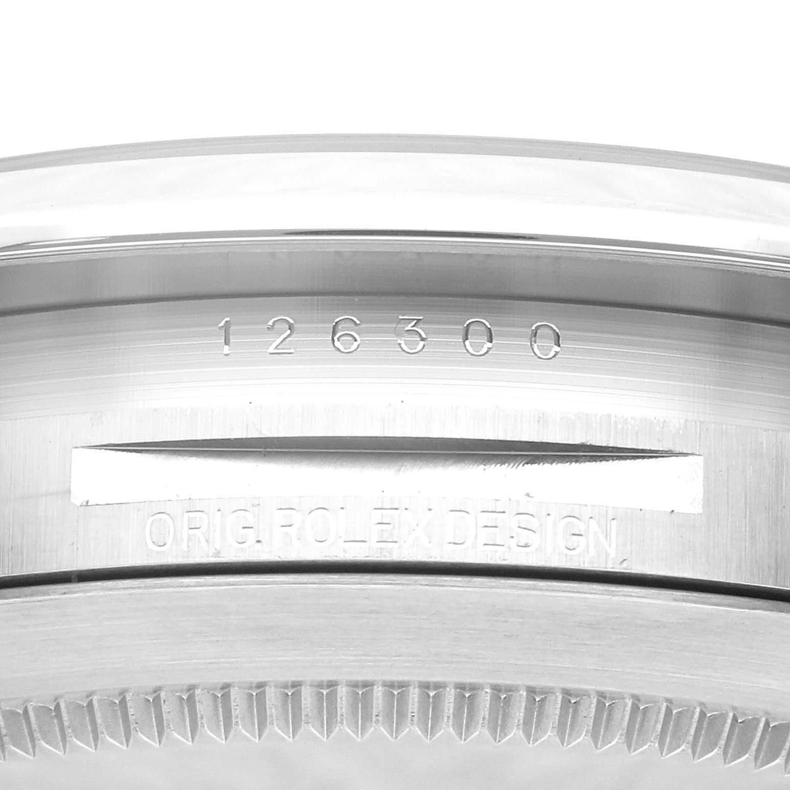 This close-up image shows the inner bezel and reference number 126300 of a Rolex Datejust 41 126300 Men
s Stainless Steel Grey Dial 126300 Men
s Stainless Steel Grey Dial watch.