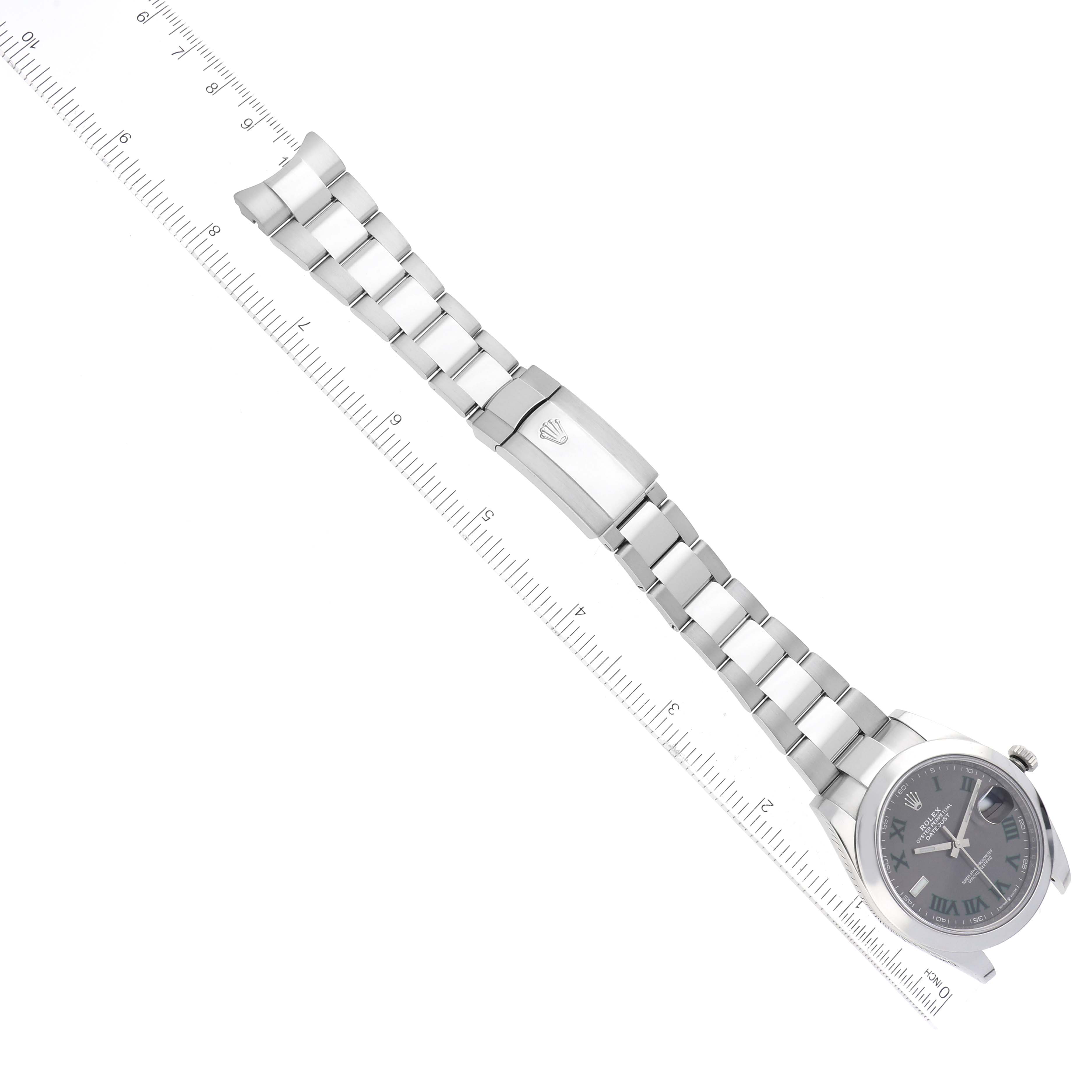 The image shows the full length of the Rolex Datejust 41 126300 Men
s Stainless Steel Grey Dial 126300 Men
s Stainless Steel Grey Dial watch, including its face, bracelet, and clasp, aligned with a ruler.