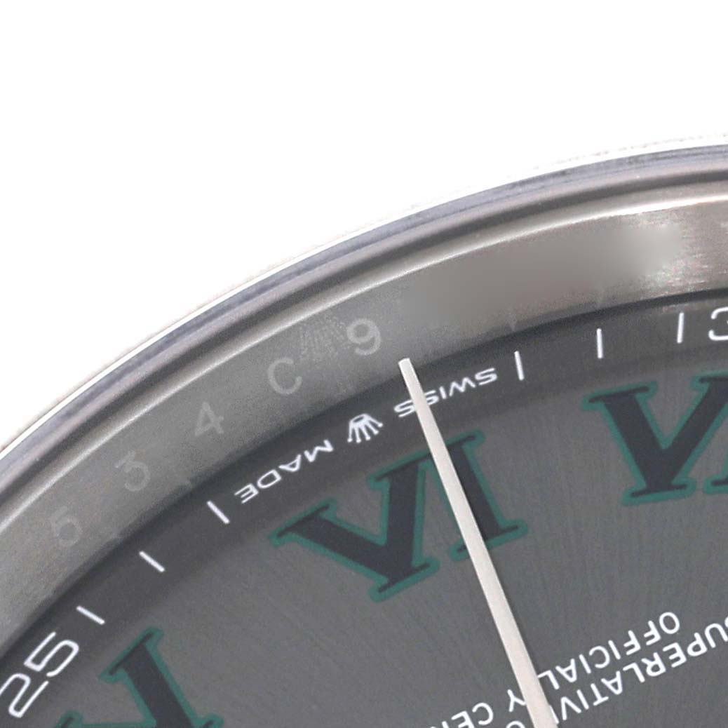 The image shows a partial view of the dial and bezel of a Rolex Datejust 41 126300 Men
s Stainless Steel Grey Dial 126300 Men
s Stainless Steel Grey Dial watch, highlighting the "Swiss Made" text and Roman numeral hour markers. 