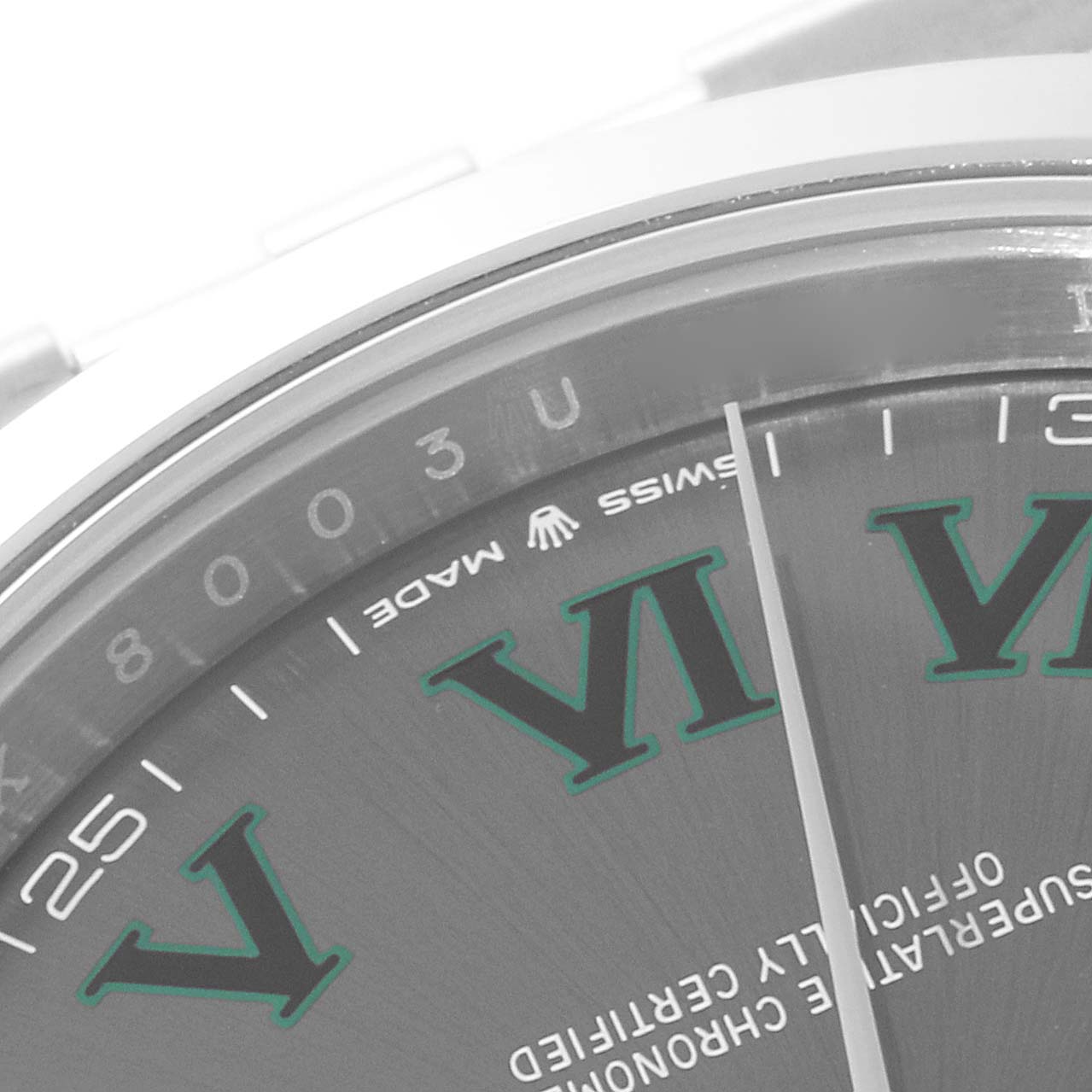 This close-up of a Rolex Datejust 41 126300 Men
s Stainless Steel Grey Dial 126300 Men
s Stainless Steel Grey Dial watch focuses on the dial, highlighting the "VI" hour marker and "Swiss Made" text.