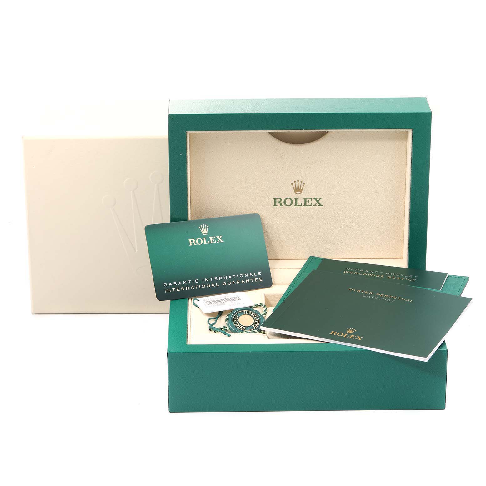 The image shows the opened packaging of a Rolex Datejust 41 126334 Men
s Stainless Steel Blue Dial 126334 Men
s Stainless Steel Blue Dial watch, showcasing warranty cards and booklets.