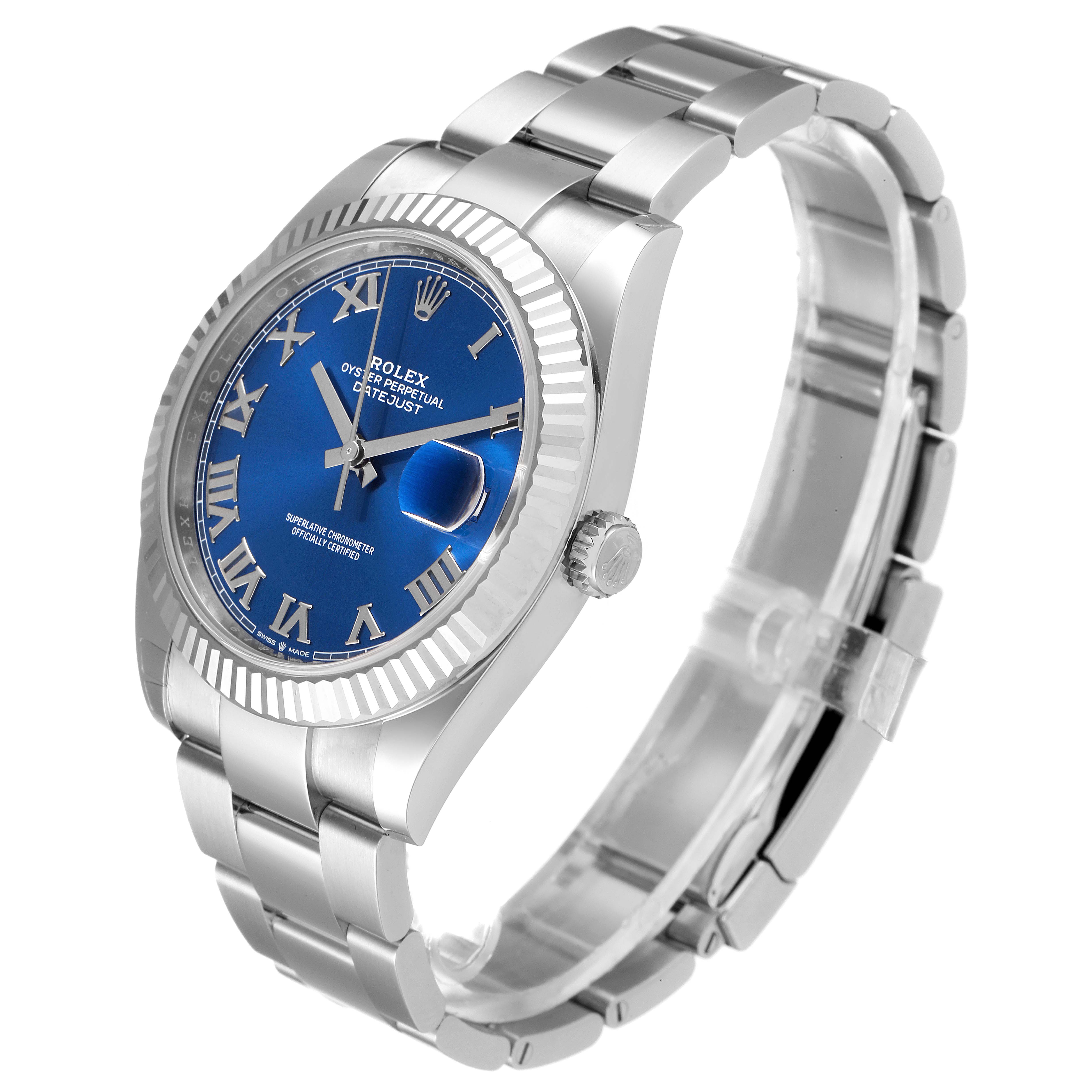 The Rolex Datejust 41 126334 Men
s Stainless Steel Blue Dial 126334 Men
s Stainless Steel Blue Dial is shown in a front-side angle, displaying its blue dial, fluted bezel, and oyster bracelet.