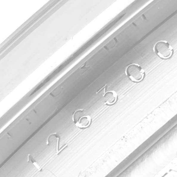 This partial image of a Rolex Datejust 41 126300 Men's Stainless Steel White Dial 126300 Men's Stainless Steel White Dial watch shows the engraved model number on the inner bezel.