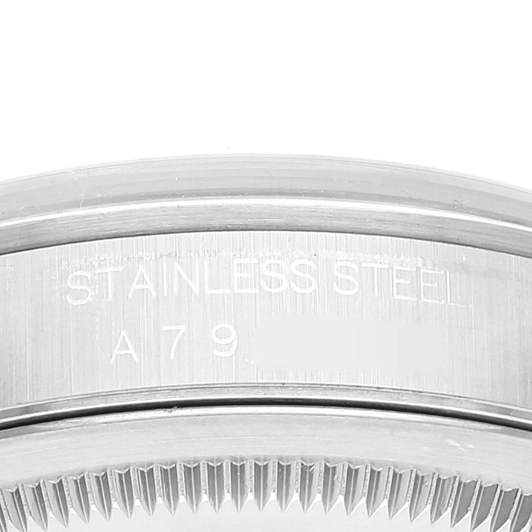 The image shows a close-up of the stainless steel case back and bezel of a Rolex Datejust 16200 Men's Stainless Steel Black Dial 16200 Men's Stainless Steel Black Dial watch.