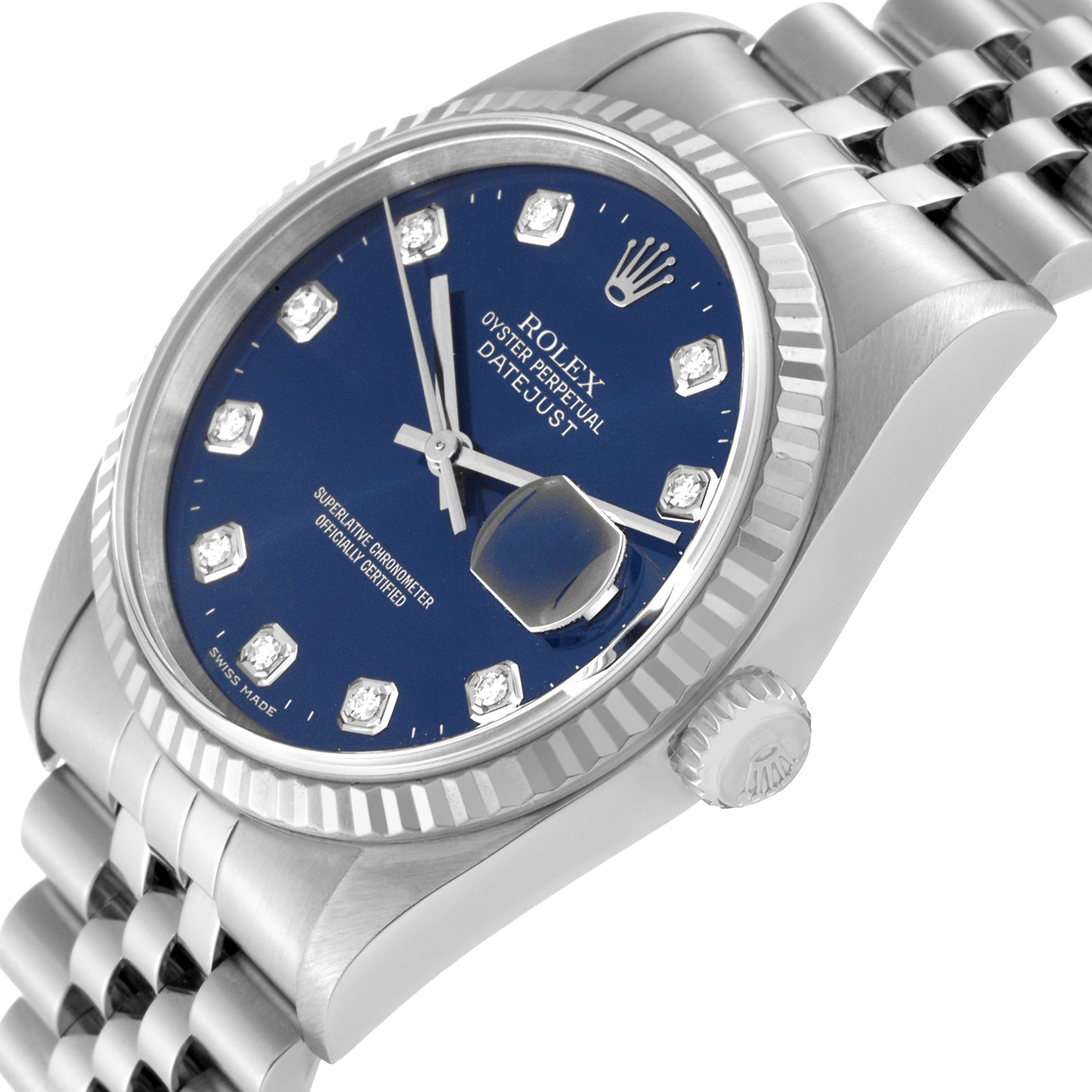 Side angle view of a Rolex Datejust 16234 Men's Stainless Steel Blue Dial 16234 Men's Stainless Steel Blue Dial watch showing its blue dial, bezel, crown, and part of the bracelet.