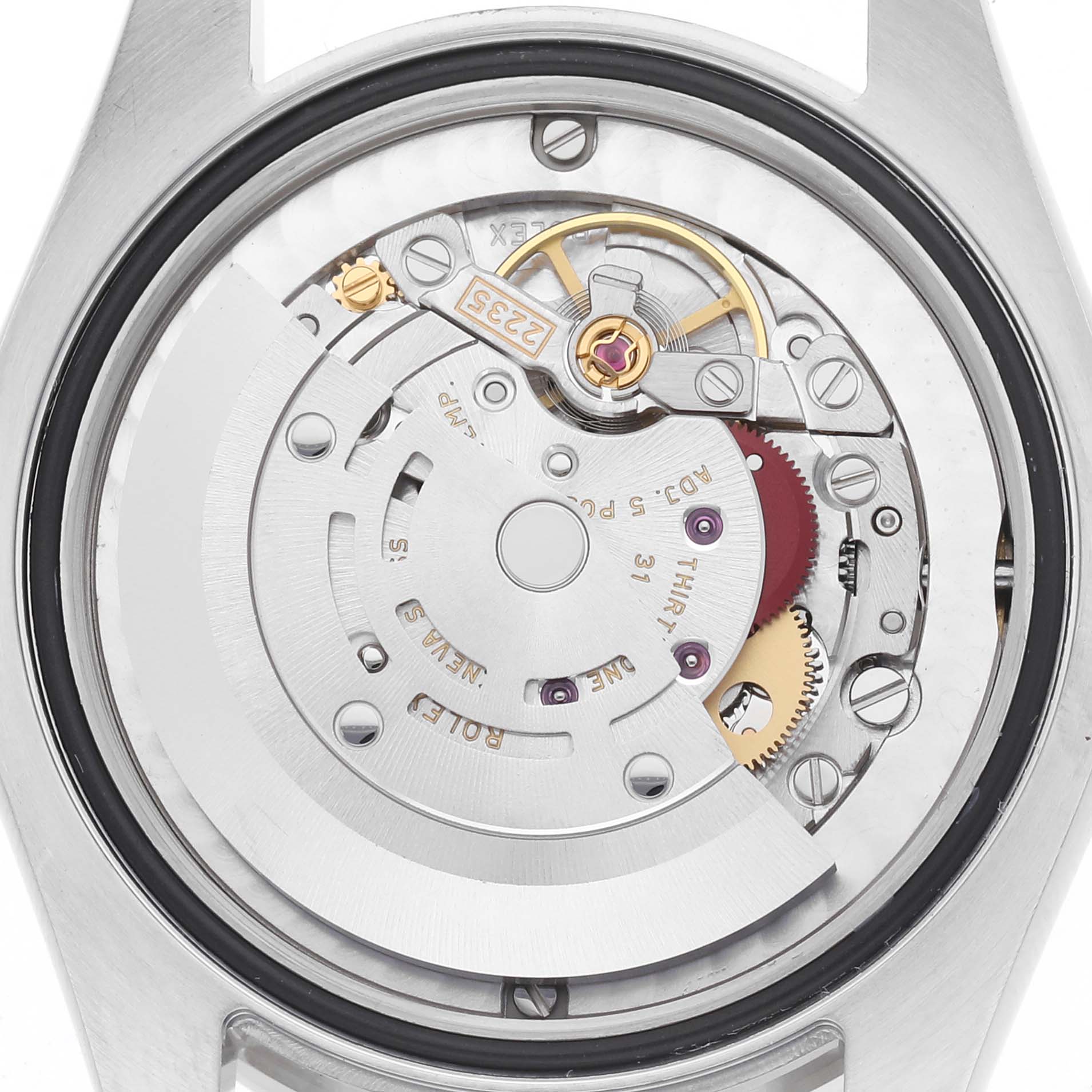 The image shows the open case back of a Rolex Mid-Size 178384 Women
s Stainless Steel Purple Dial 178384 Women
s Stainless Steel Purple Dial model, revealing the movement and intricate components.