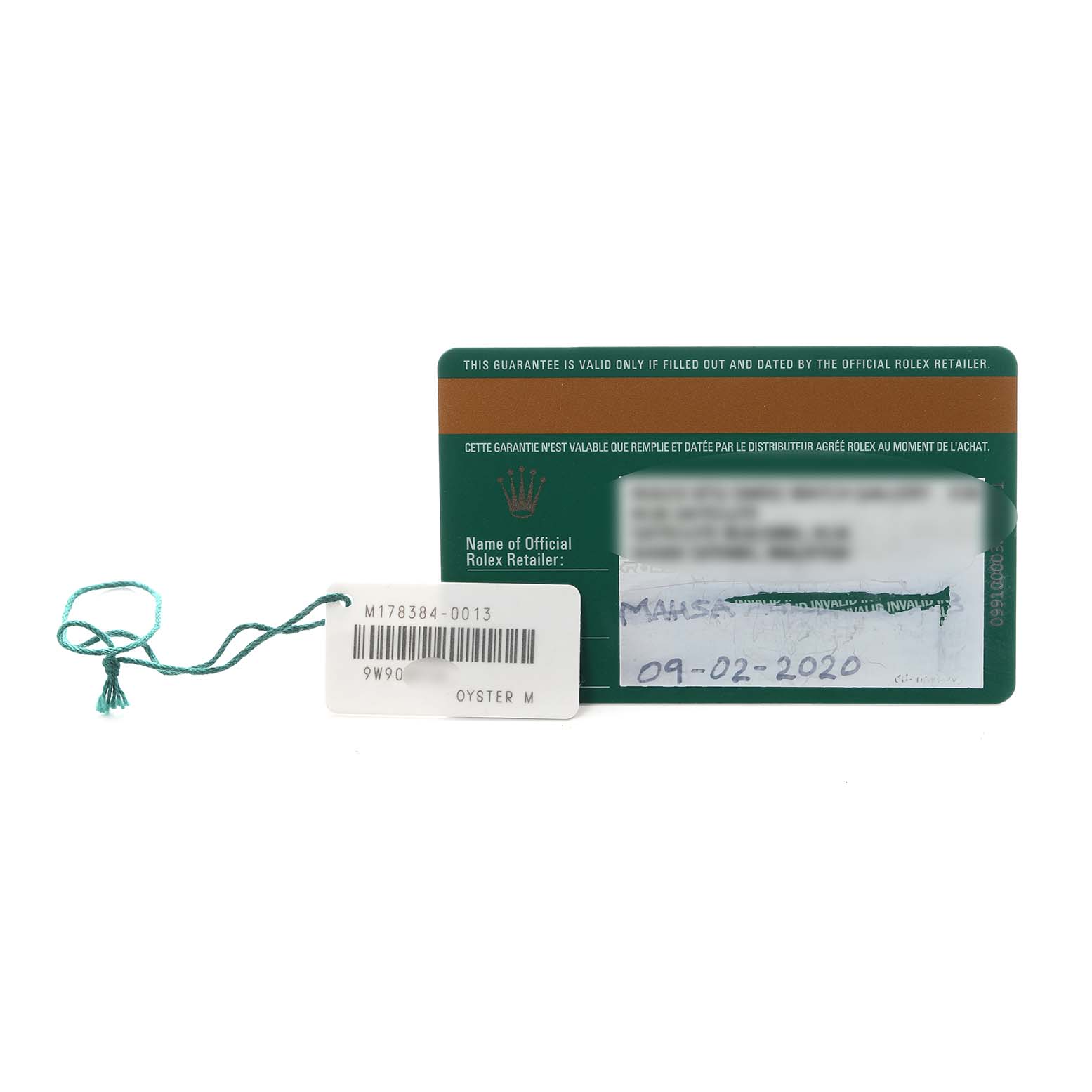 The image shows a Rolex warranty card and tag for a Mid-Size model, displaying serial numbers and retailer information.