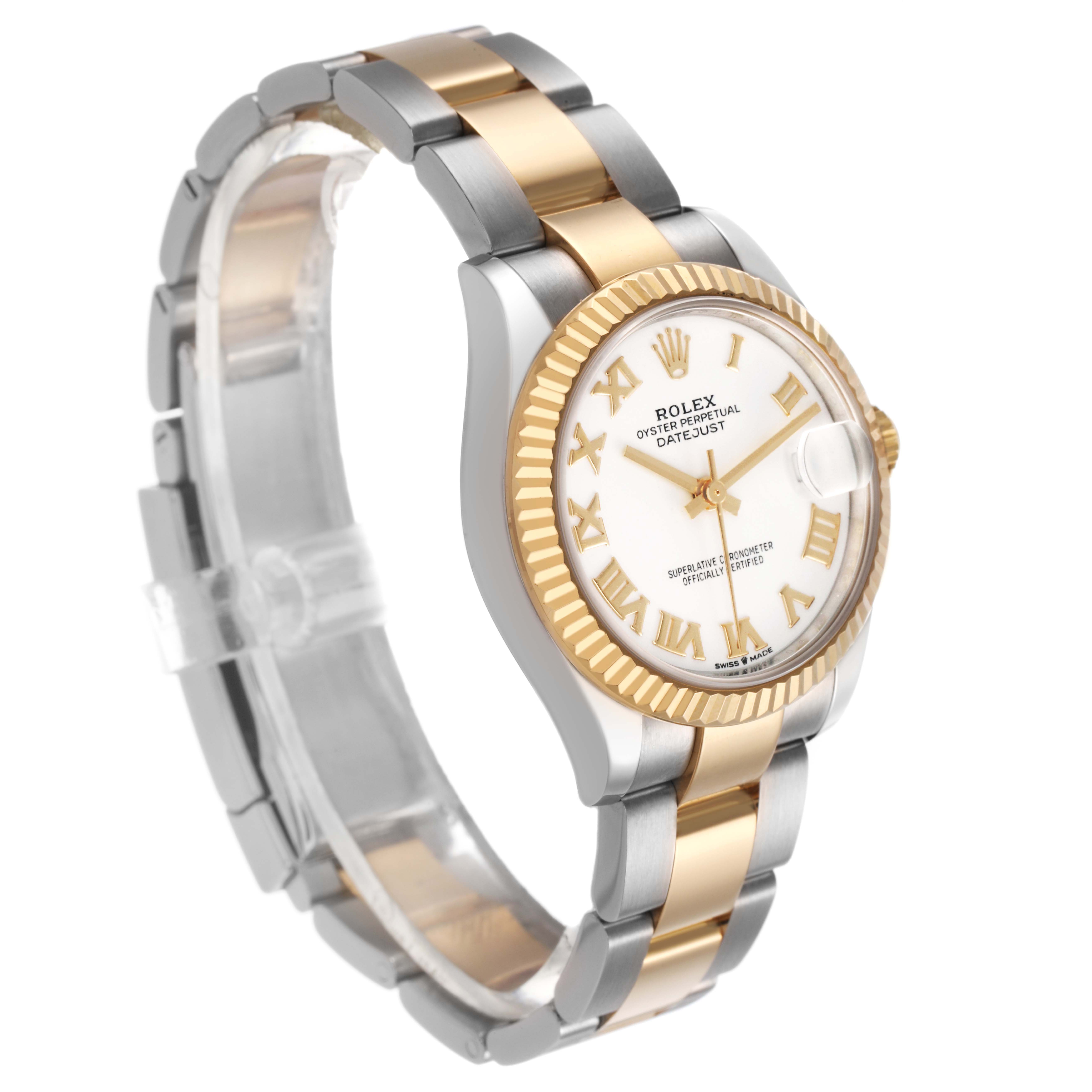 The Rolex Mid-Size 278273 Women's Steel and Gold (two tone) White Dial watch, viewed from an angle, shows its gold and silver bracelet, fluted bezel, and Roman numeral dial.
