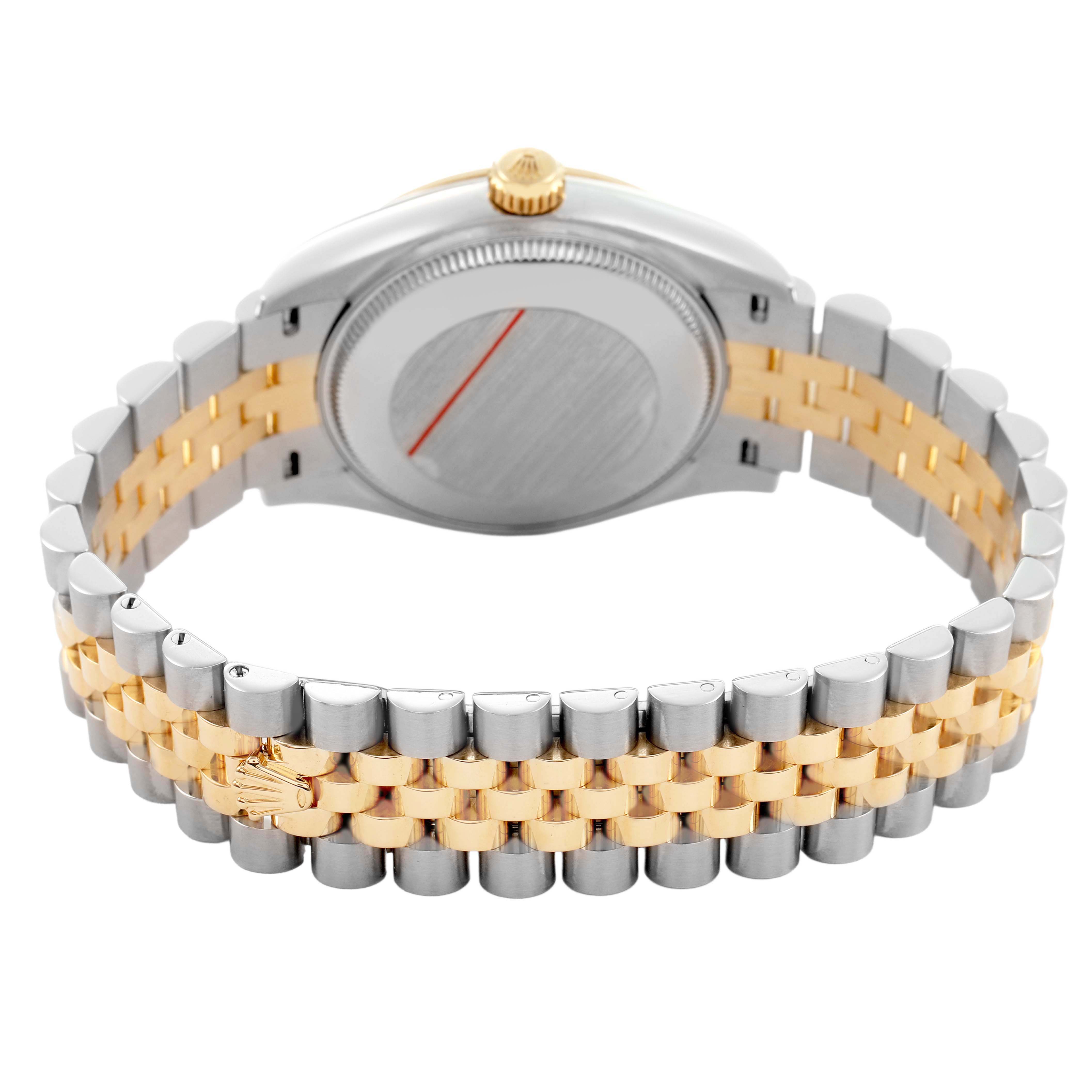 The Rolex Mid-Size 278273 Women's Steel and Gold (two tone) Silver Dial model is shown from the back, highlighting the two-tone bracelet and the watch's case back.