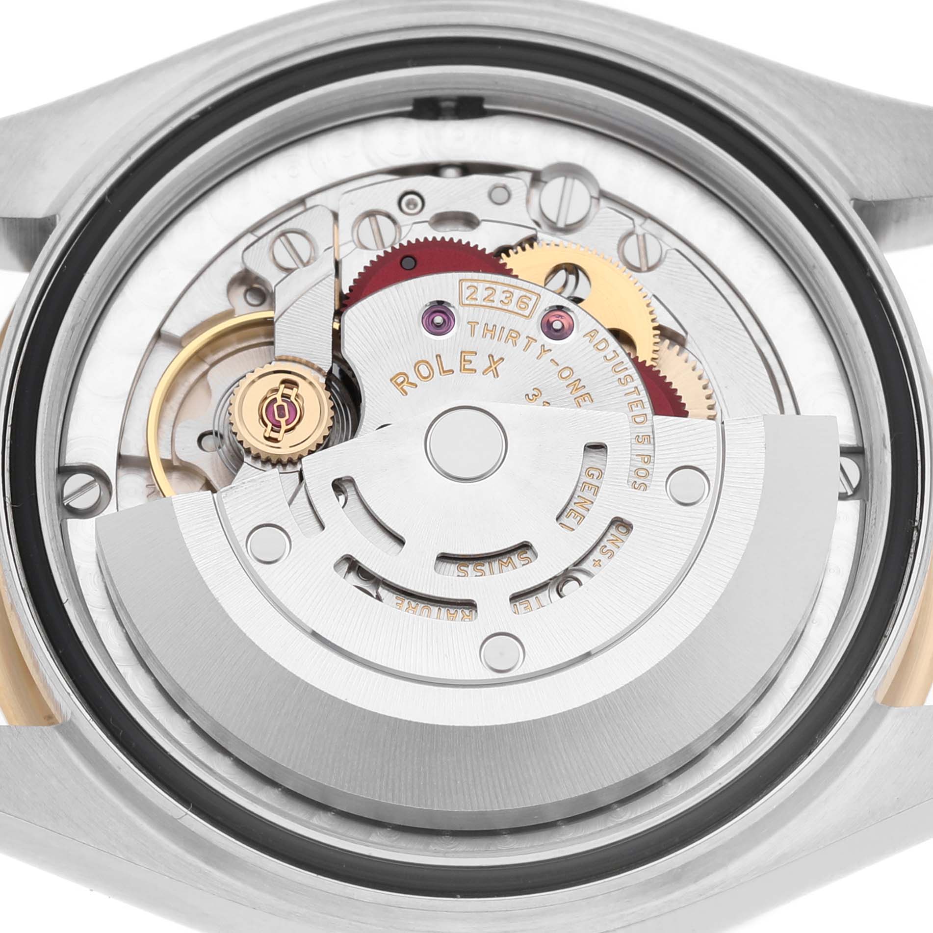 The image shows the internal mechanism of a Rolex Mid-Size 278273 Women's Steel and Gold (two tone) Brown Dial watch, highlighting the rotor and gears from a top view.
