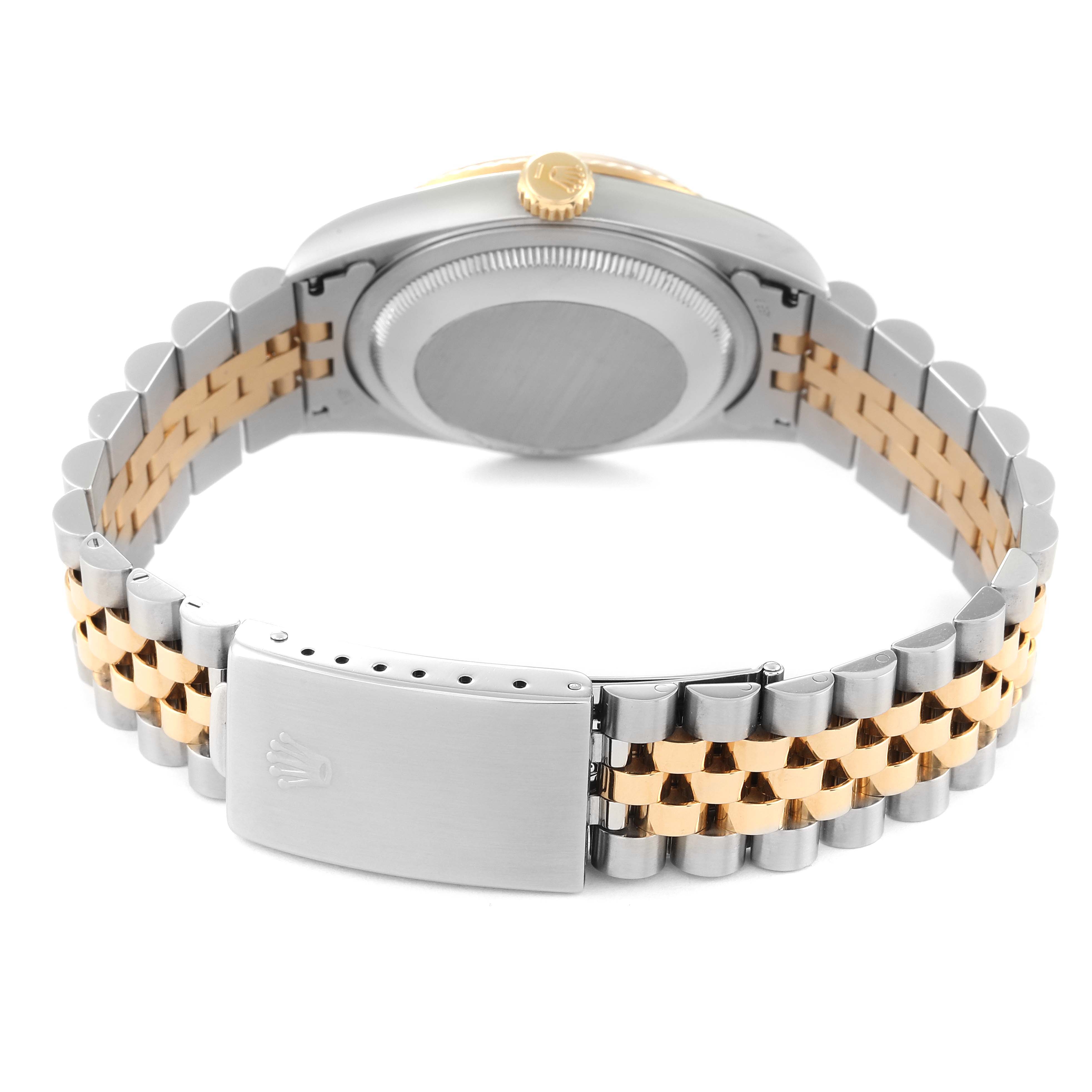 This Rolex Datejust 16233 Men's Steel and Gold (two tone) Champagne Dial 16233 Men's Steel and Gold (two tone) Champagne Dial watch is shown from the back, highlighting its two-tone bracelet, case back, and clasp with the Rolex logo.