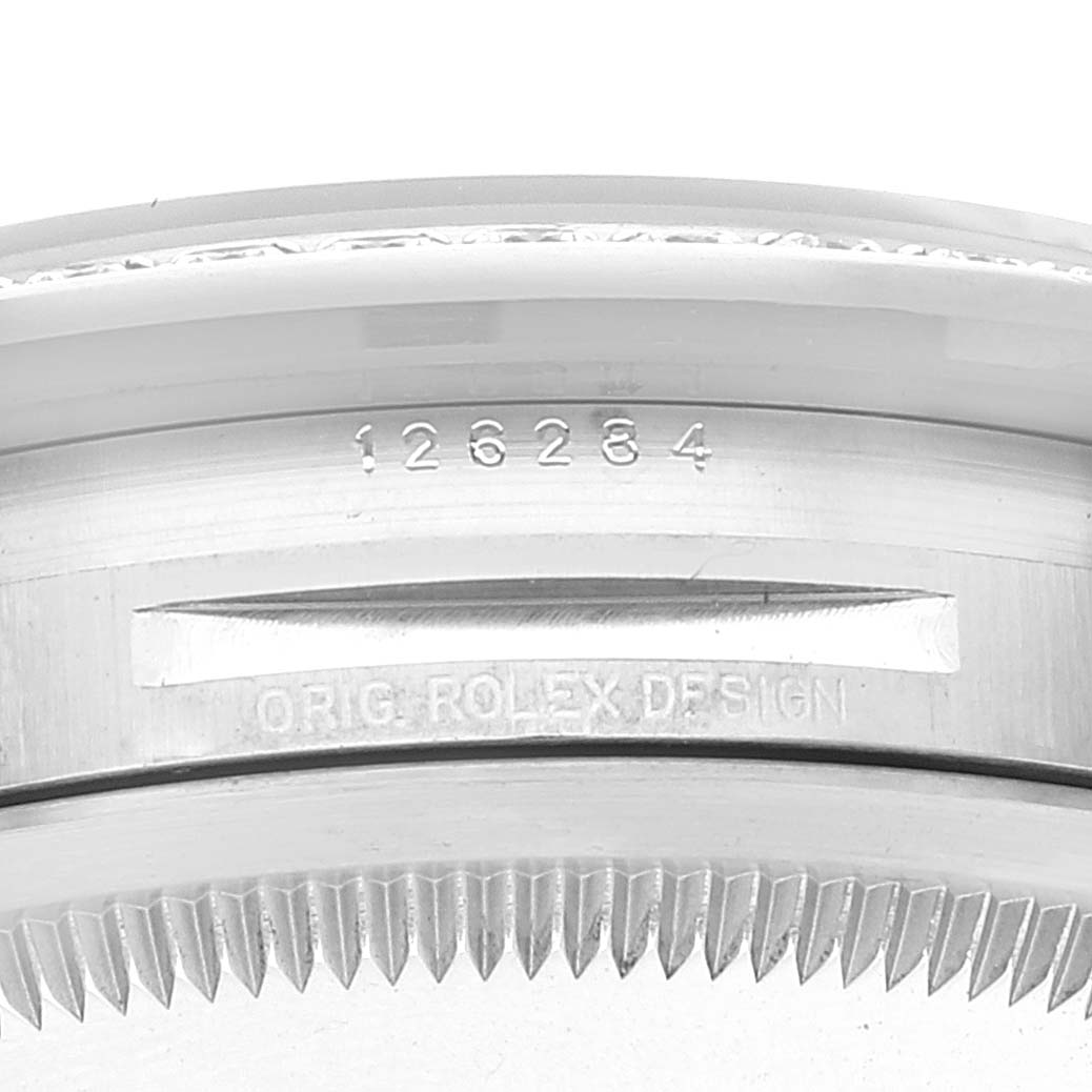 This image shows a close-up of the model number and bezel on a Rolex Datejust 126284RBR Men's Stainless Steel Black Dial 126284RBR Men's Stainless Steel Black Dial watch.