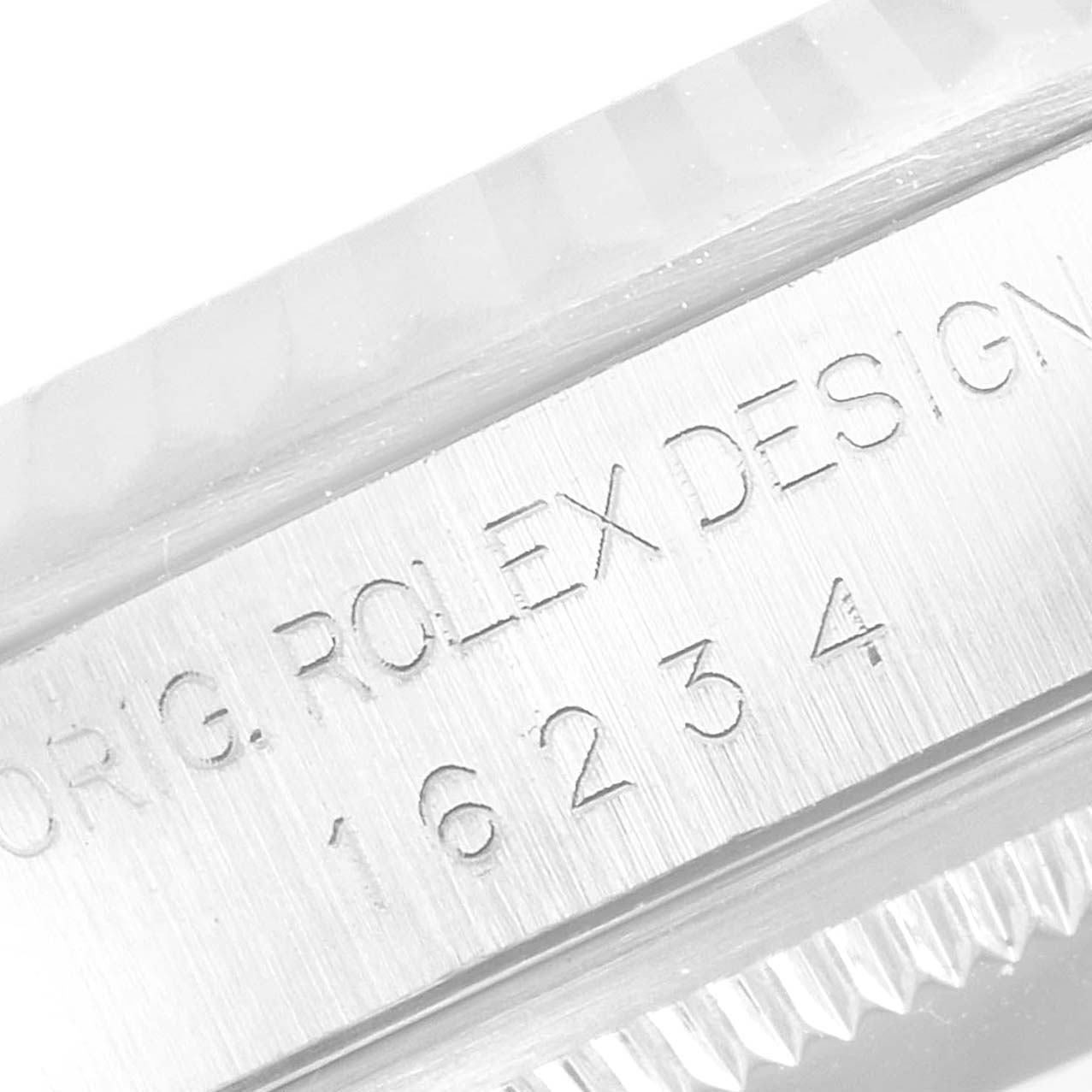 This photo shows a close-up of the engraved model number "16234" on the side of the Rolex Datejust 16234 Men's Stainless Steel Black Dial 16234 Men's Stainless Steel Black Dial watch case.
