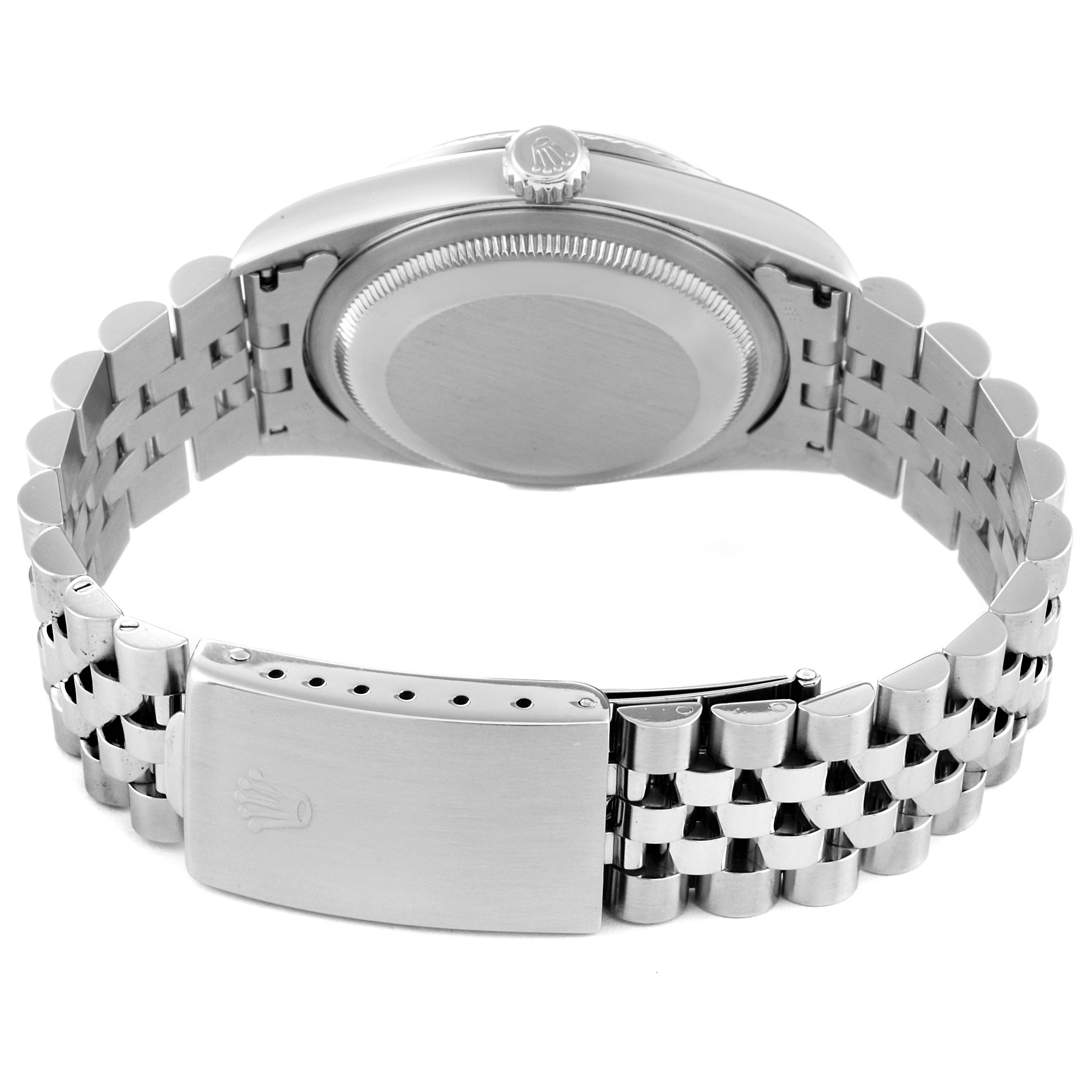 This Rolex Datejust 16234 Men's Stainless Steel Black Dial 16234 Men's Stainless Steel Black Dial watch is shown from the rear, displaying the case back, crown, and the bracelet with a clasp.