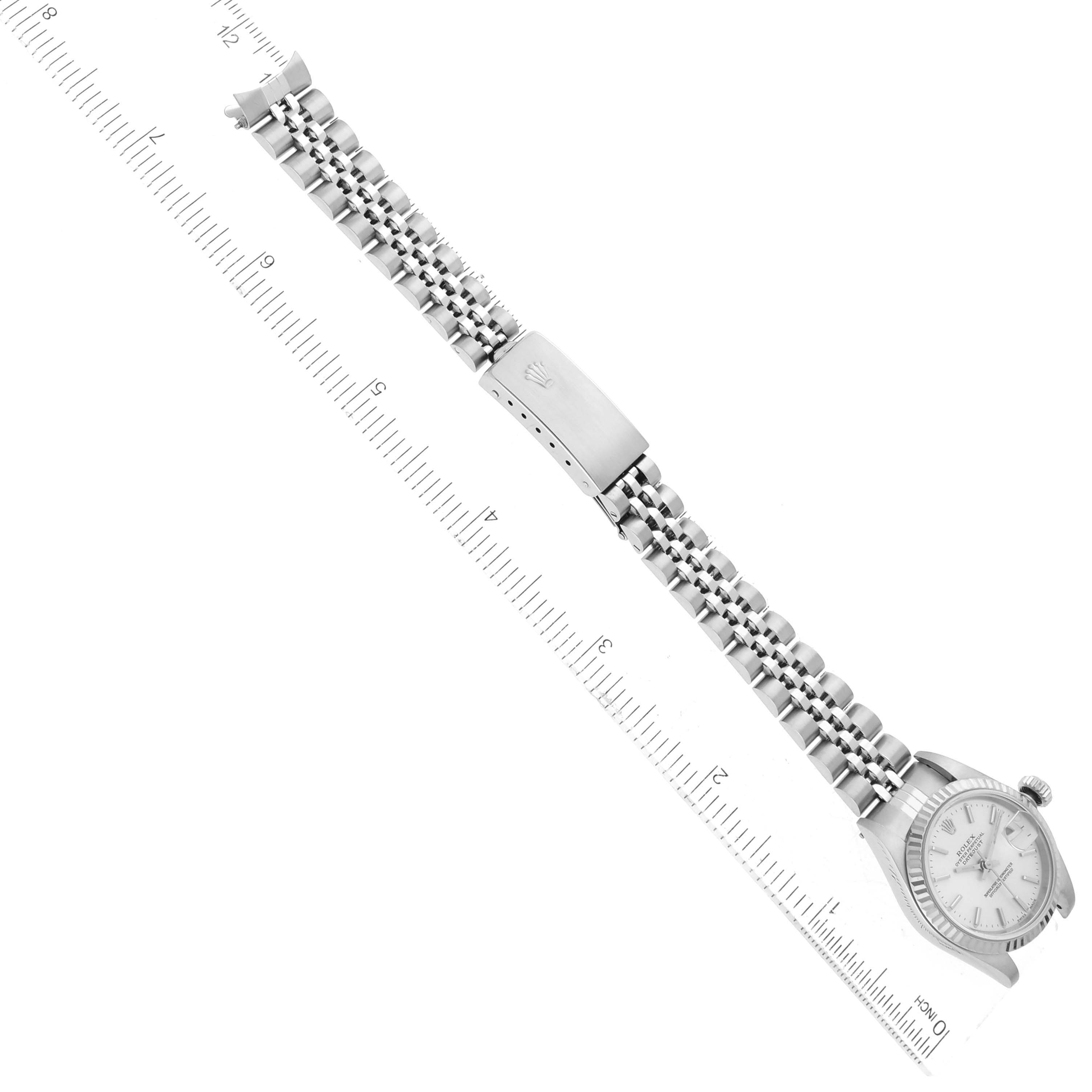 This image shows a top-down view of a Rolex Datejust 79174 Women
s Stainless Steel Silver Dial 79174 Women
s Stainless Steel Silver Dial watch, including the face, bezel, bracelet, and clasp.