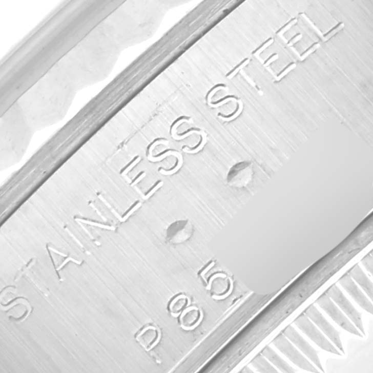 This image shows a close-up of the stainless steel marking on the inner rim of a Rolex Datejust 79147 Women's Stainless Steel Mother of Pearl Dial 79147 Women's Stainless Steel Mother of Pearl Dial watch.