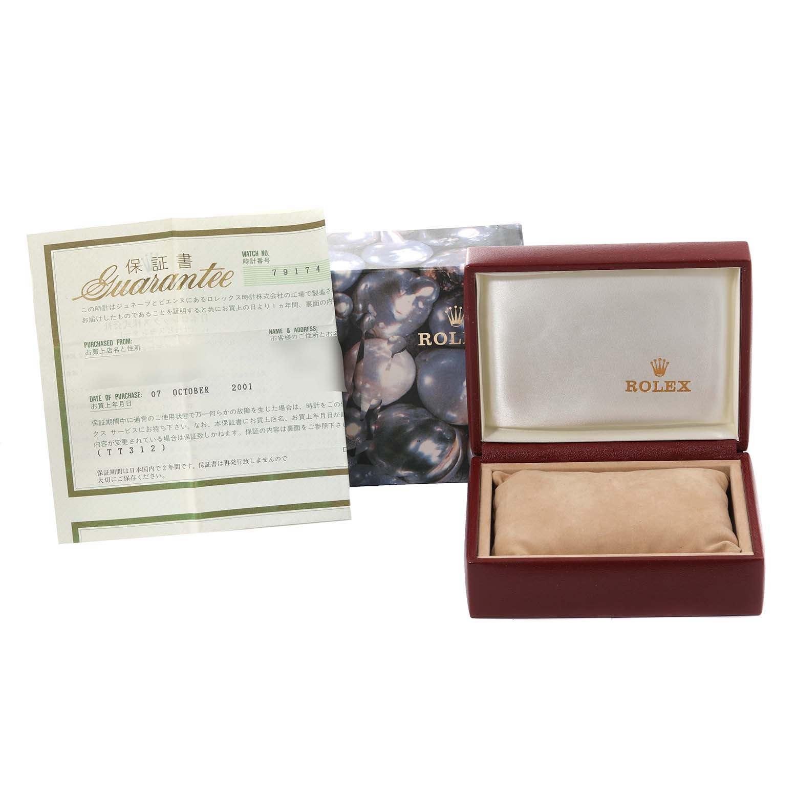 This image shows the guarantee card, outer box, and inner box for the Rolex Datejust 79147 Women's Stainless Steel Mother of Pearl Dial 79147 Women's Stainless Steel Mother of Pearl Dial watch.