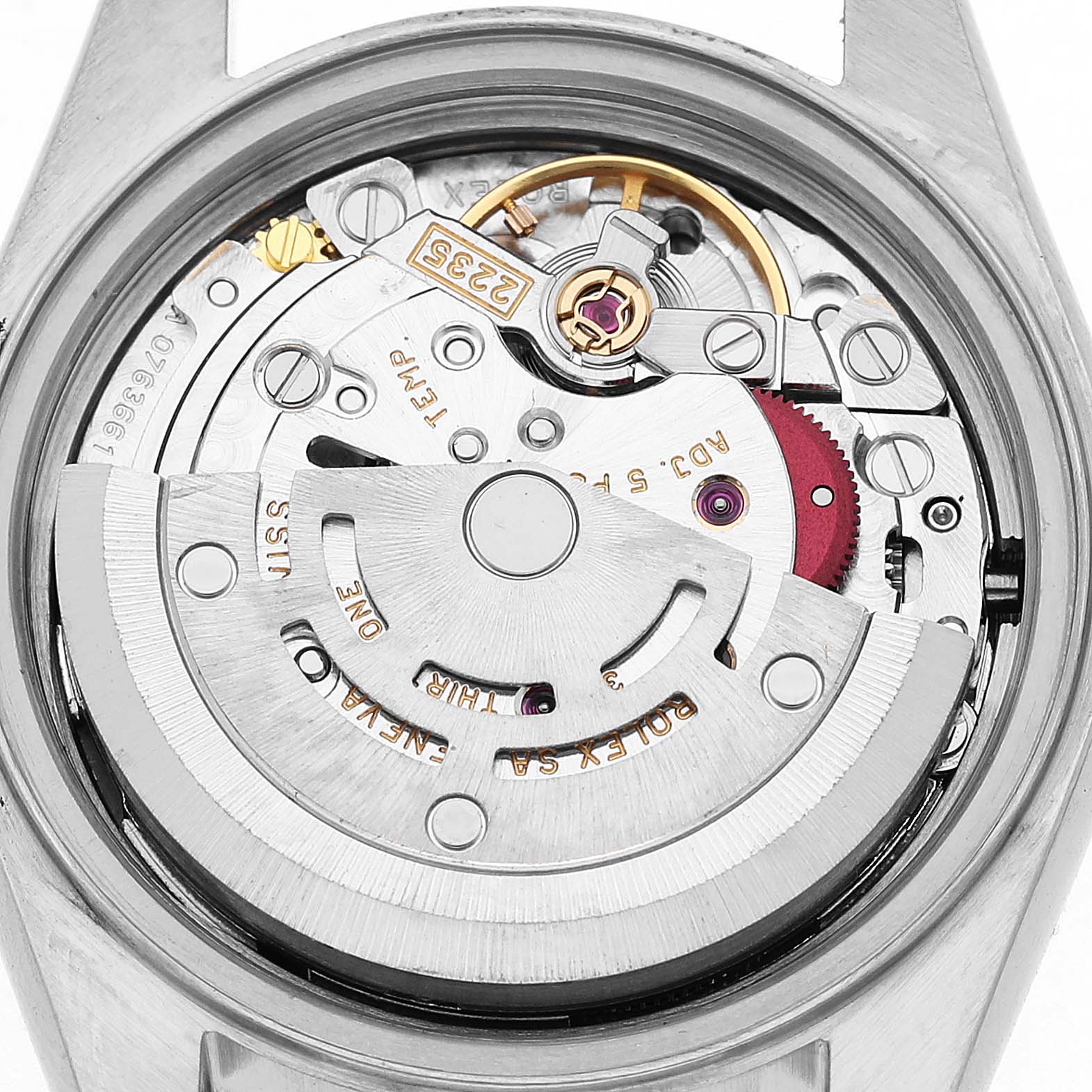 The image shows the movement of a Rolex Datejust 79174 Women's Stainless Steel Silver Dial watch from a top-down angle, highlighting its intricate mechanical parts and rotor.