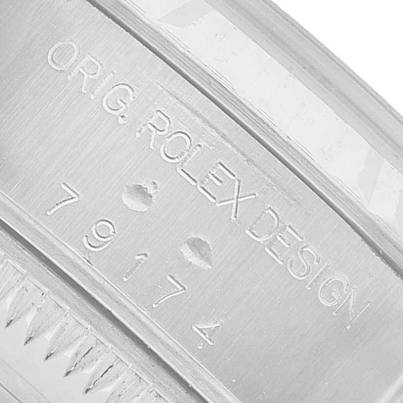 The image shows an engraved part of the case with the model number on the Rolex Datejust 79174 Women's Stainless Steel Silver Dial watch.