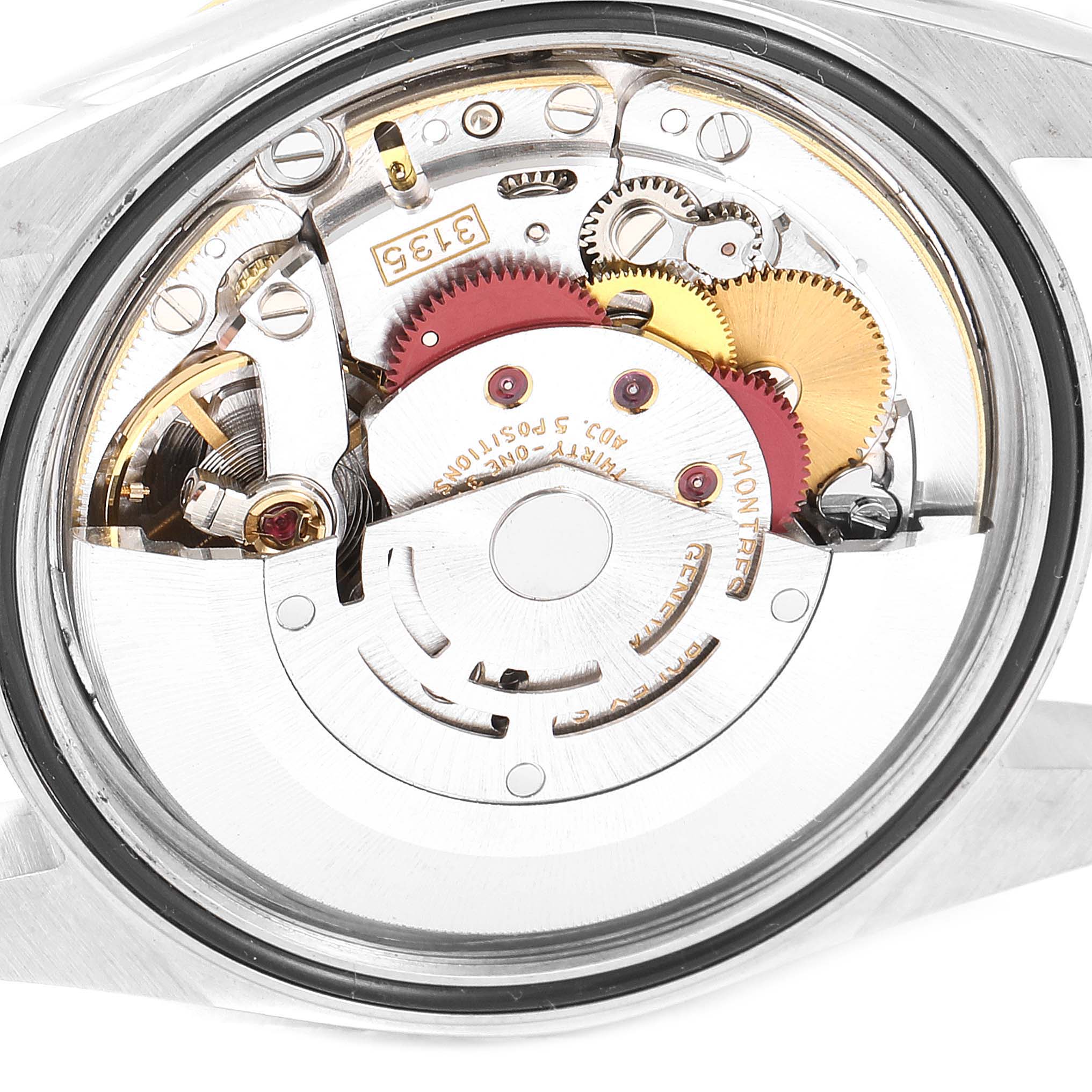 The image shows the internal mechanical movement of a Rolex Datejust 16233 Men's Steel and Gold (two tone) Champagne Dial 16233 Men's Steel and Gold (two tone) Champagne Dial watch viewed from the back.