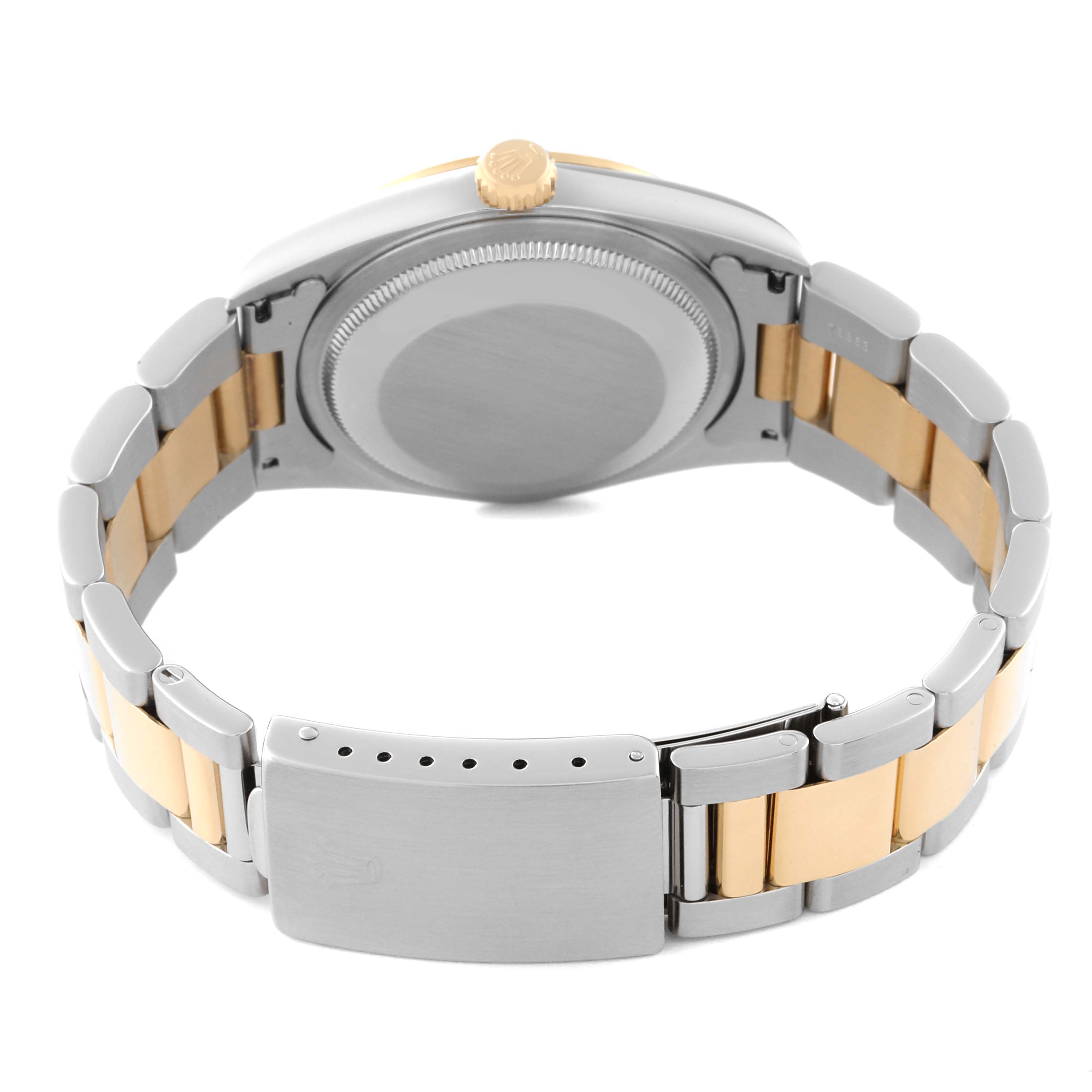 The image shows the back case, bracelet, and clasp of a Rolex Datejust 16203 Men
s Steel and Gold (two tone) White Dial 16203 Men
s Steel and Gold (two tone) White Dial watch, highlighting its two-tone metal design.