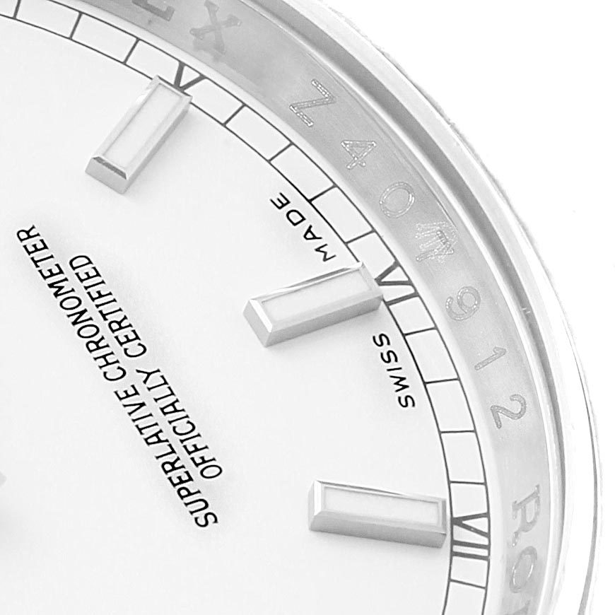 This close-up image shows the dial and part of the bezel of a Rolex Datejust 116200 Men's Stainless Steel White Dial 116200 Men's Stainless Steel White Dial watch.