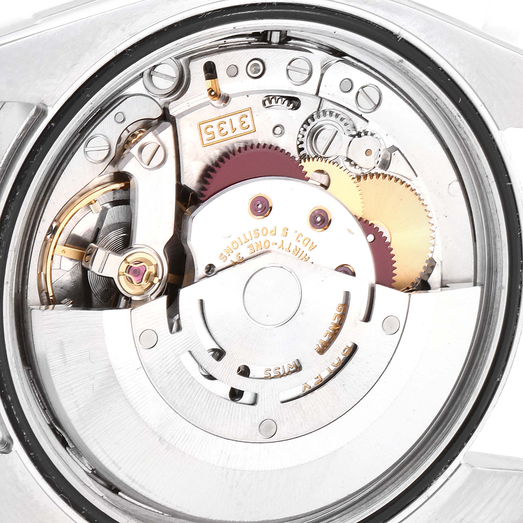 The image shows an inside view of the Rolex Datejust 116200 Men's Stainless Steel White Dial 116200 Men's Stainless Steel White Dial watch, focusing on its mechanical movement.