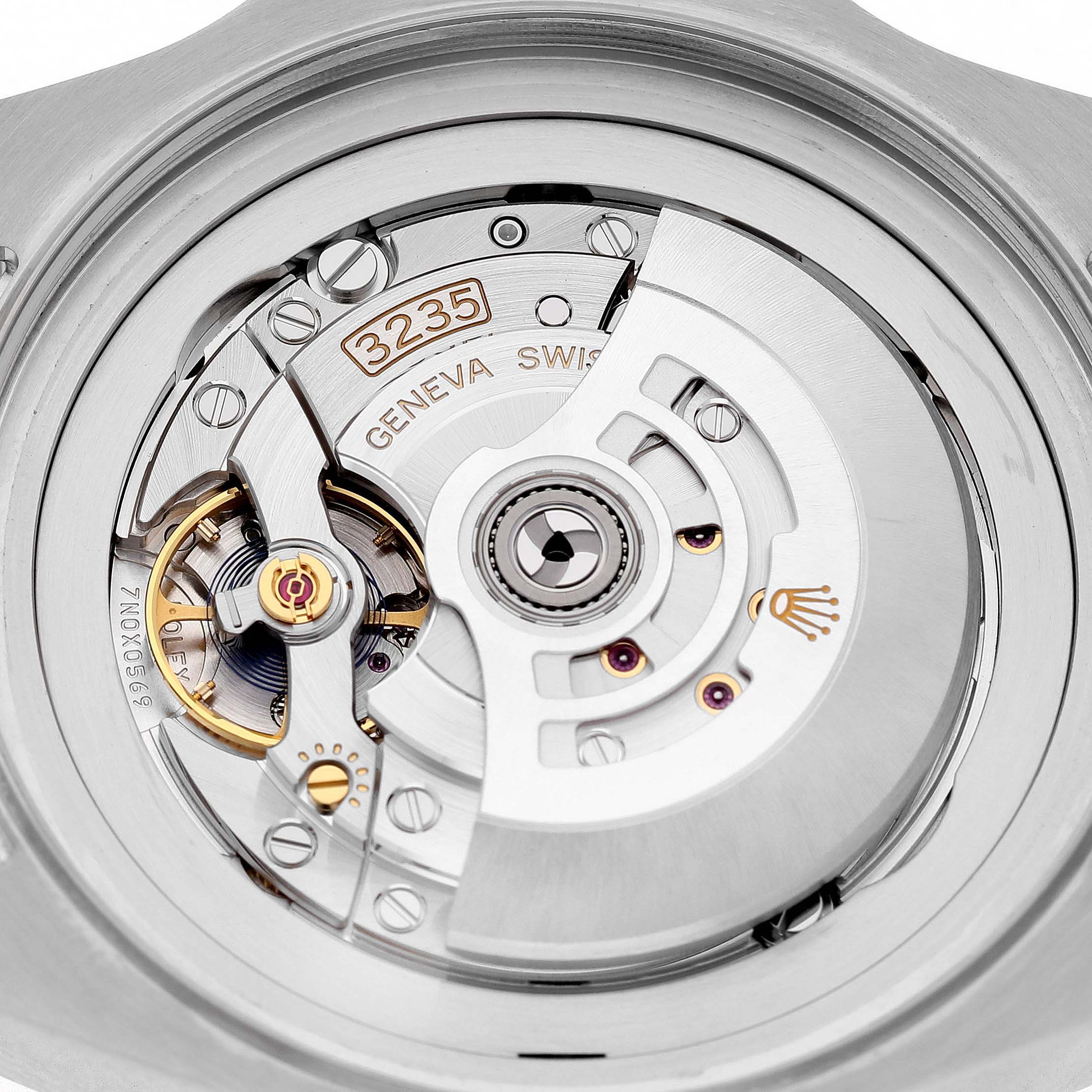 The image shows the intricate watch movement of the Rolex Sea-Dweller 136660 Men's Stainless Steel Blue Dial, viewed from the back.