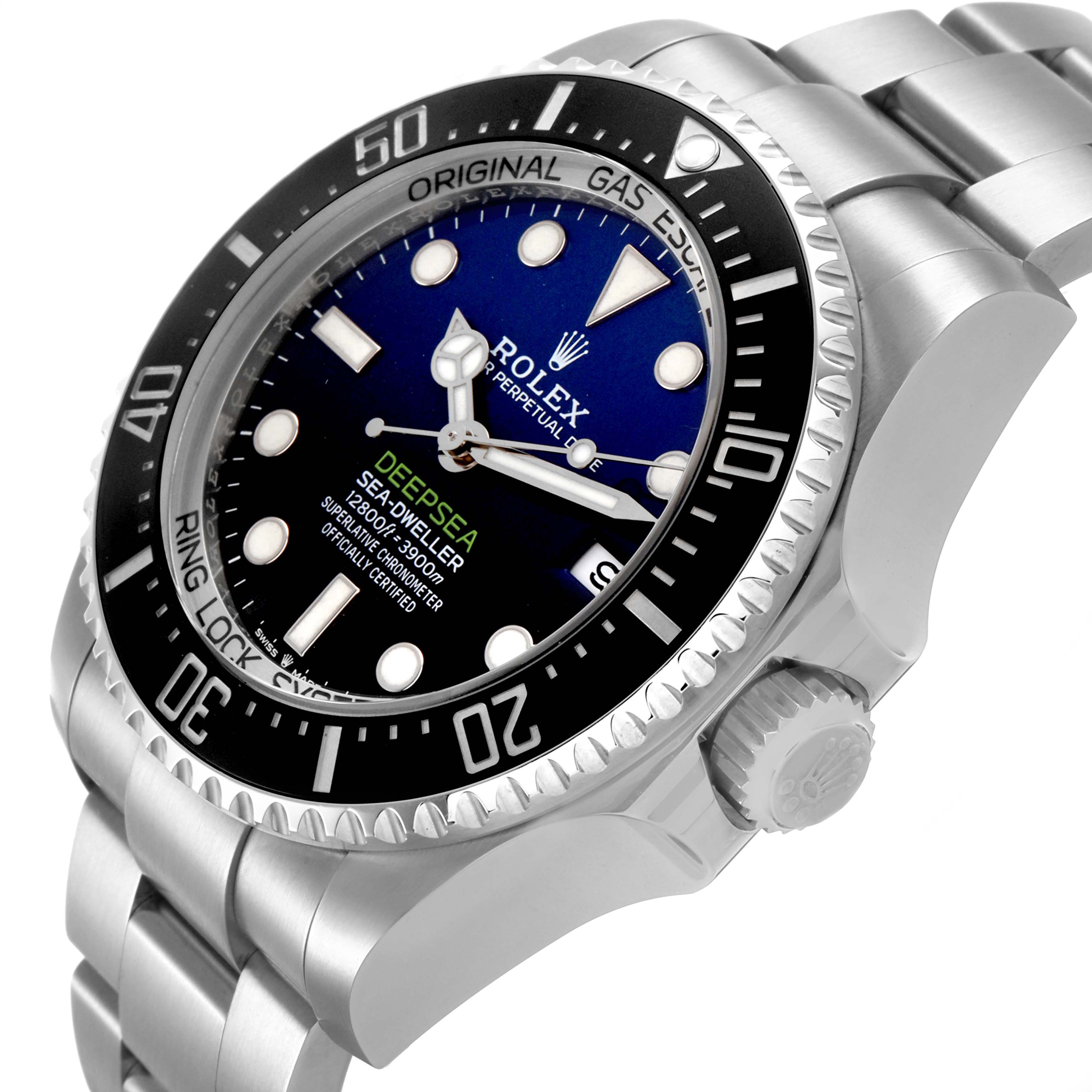 The image shows a angled view of the Rolex Sea-Dweller 136660 Men's Stainless Steel Blue Dial watch, highlighting its face, bezel, and bracelet.