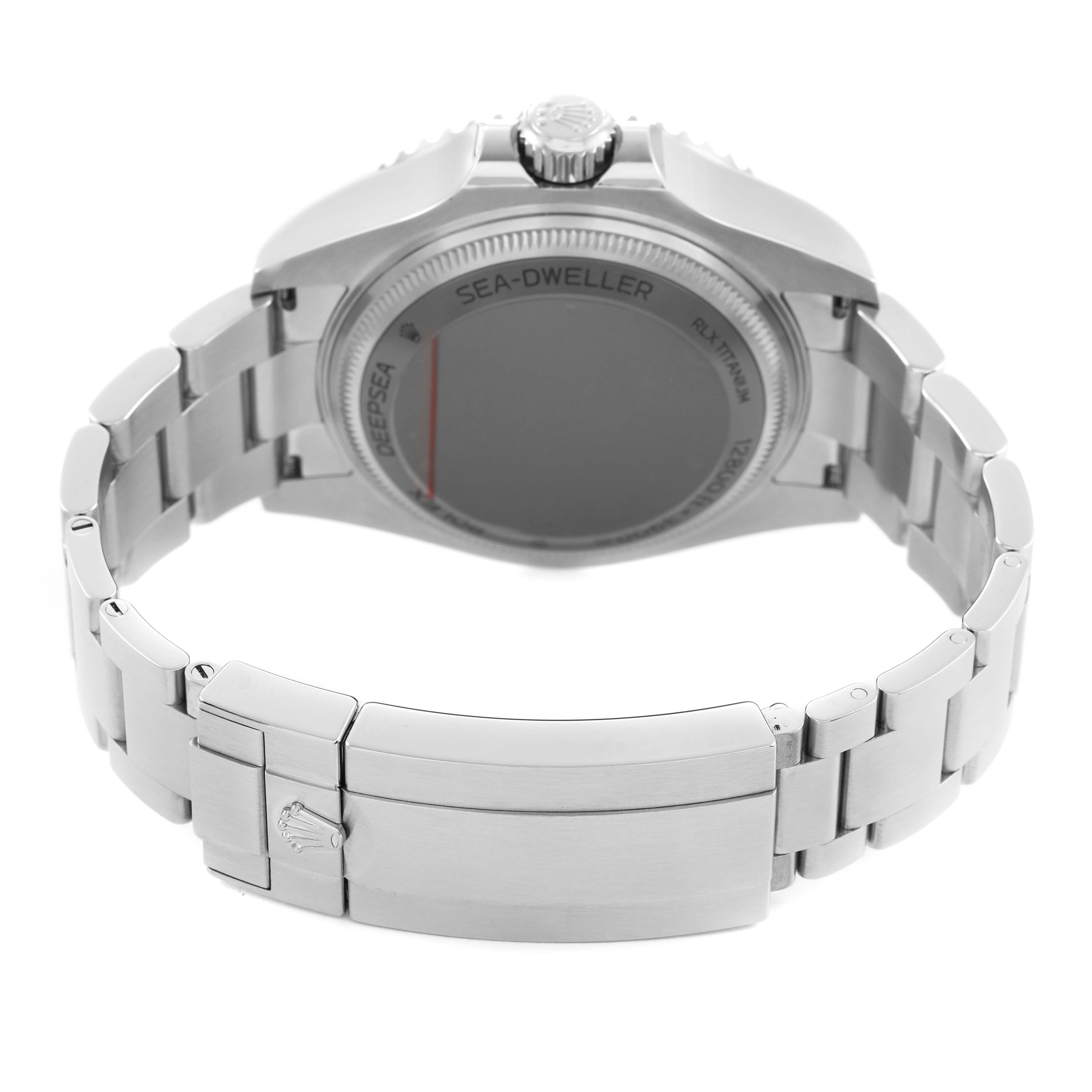 The Rolex Sea-Dweller 136660 Men's Stainless Steel Blue Dial watch is shown from the back, highlighting the bracelet, clasp, and case back details.