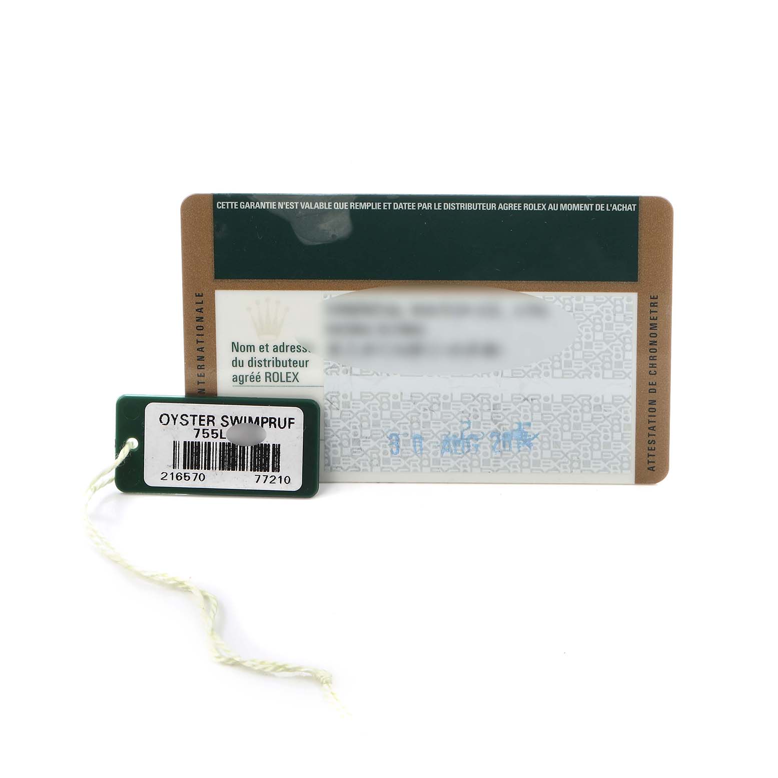 The image shows a Rolex Explorer 216570 Men
s Stainless Steel Black Dial 216570 Men
s Stainless Steel Black Dial warranty card and tag with barcode details, flat on a white background.