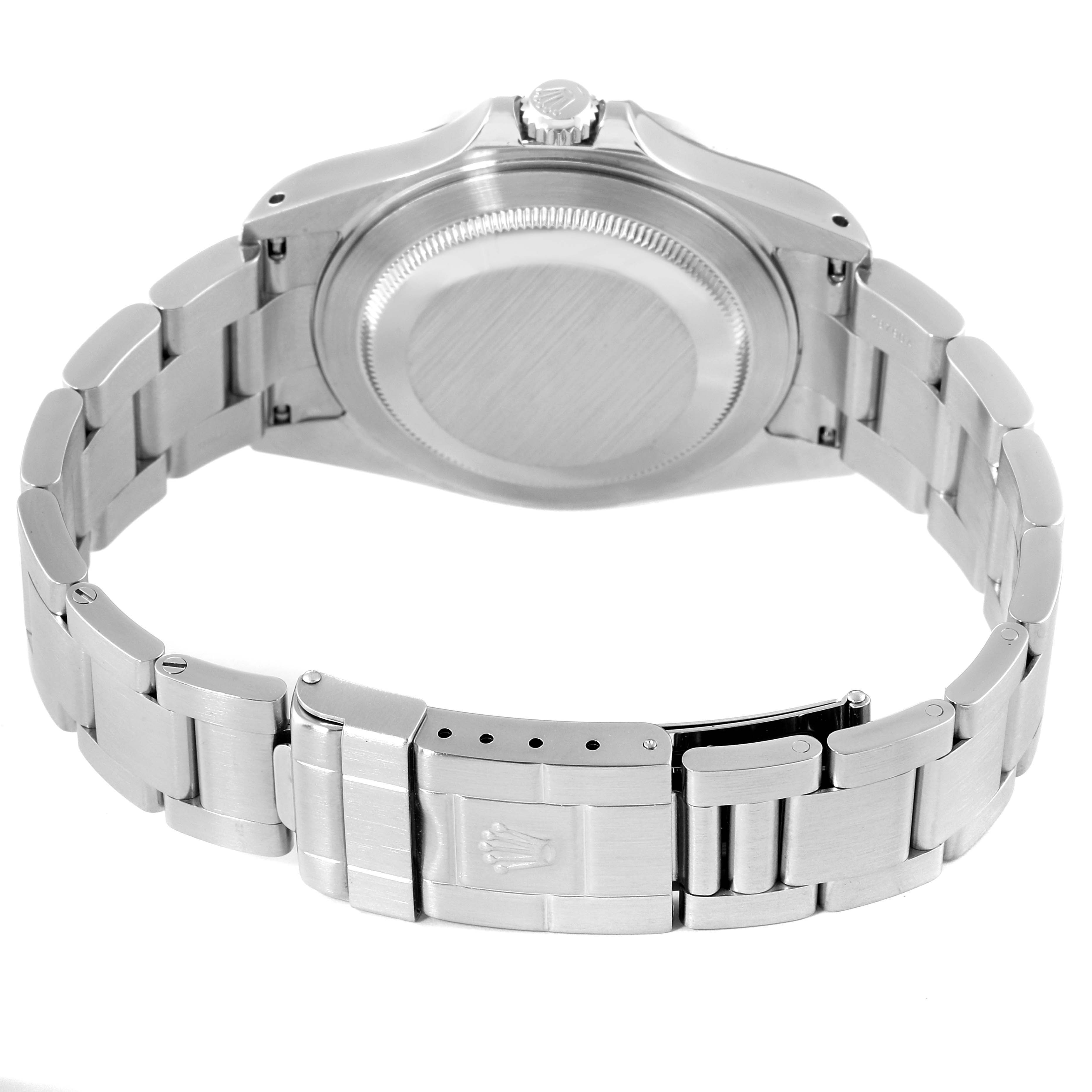 The image shows the back view of a Rolex Explorer 16570 Men's Stainless Steel Black Dial 16570 Men's Stainless Steel Black Dial model watch, highlighting the case back and stainless steel bracelet with clasp.