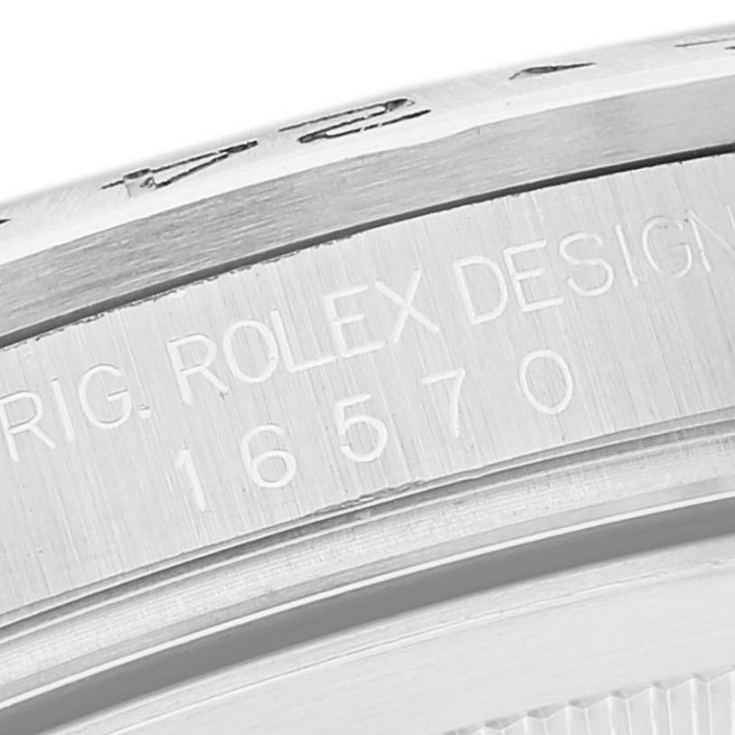 This image shows a close-up of the side engraving on a Rolex Explorer 16570 Men's Stainless Steel Black Dial 16570 Men's Stainless Steel Black Dial watch, depicting the model number 16570.