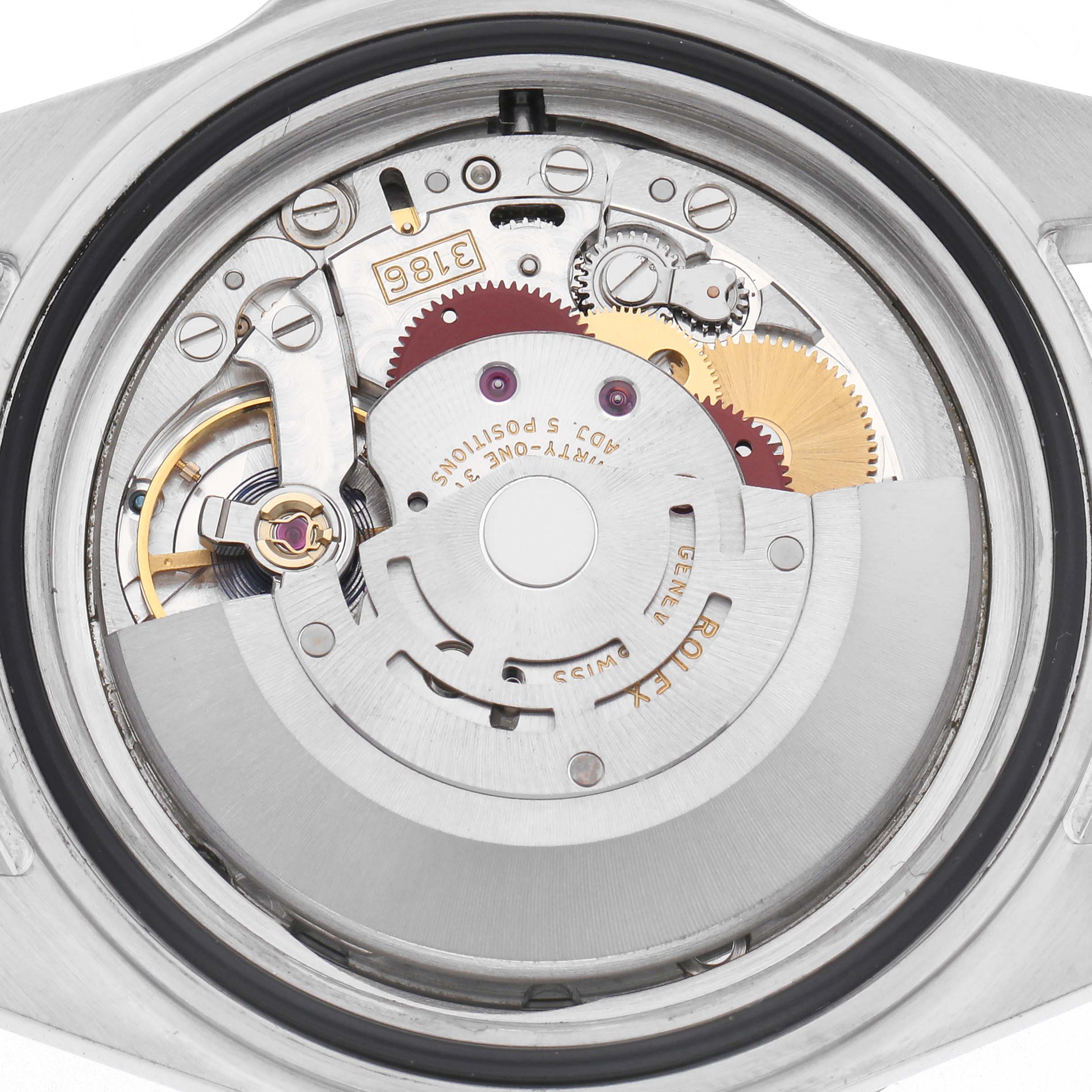 The image shows the back view of a Rolex Explorer 16570 Men
s Stainless Steel Black Dial 16570 Men
s Stainless Steel Black Dial, focusing on its movement and internal mechanics.