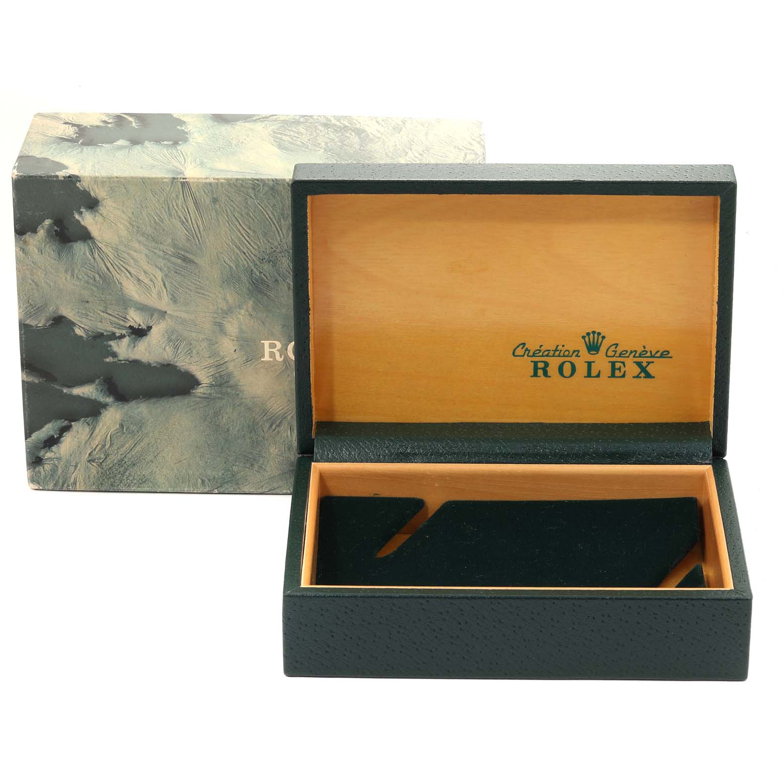 This image shows an open Rolex GMT-Master 16700 Men's Stainless Steel Black Dial 16700 Men's Stainless Steel Black Dial watch box and its outer sleeve.