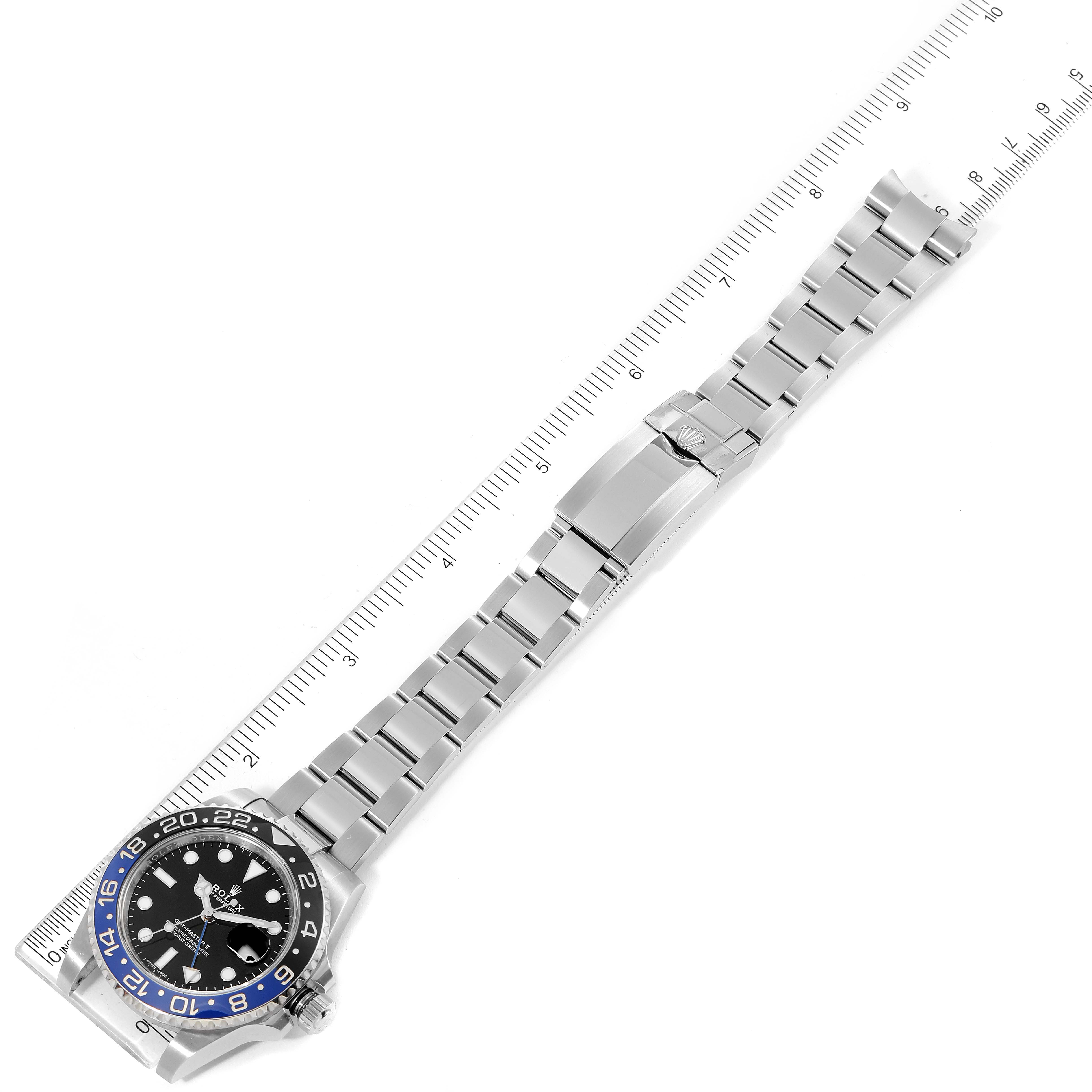 The image shows a top-down view of a Rolex GMT-Master 116710 Men's Stainless Steel Black Dial 116710 Men's Stainless Steel Black Dial watch, highlighting the dial, bezel, bracelet, and clasp.