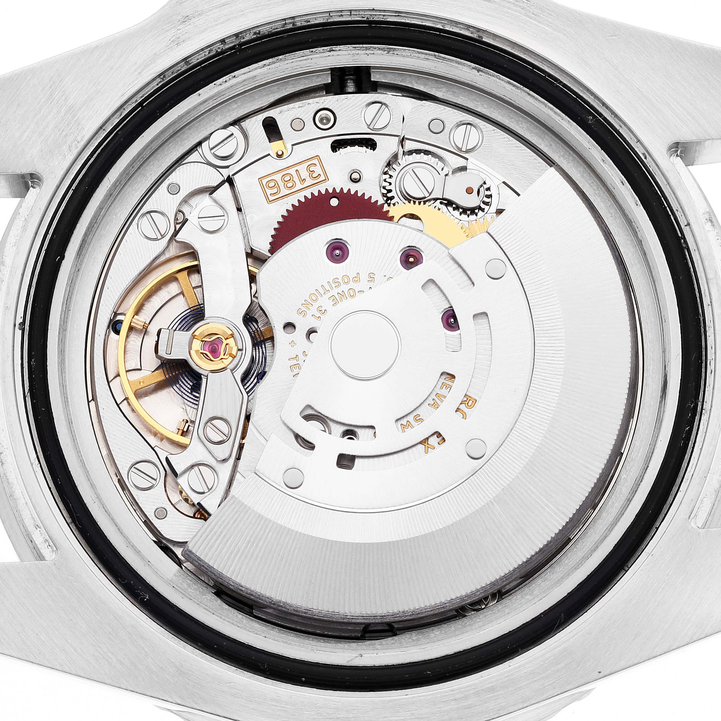 The image shows the movement and internal mechanism of a Rolex GMT-Master 116710 Men
s Stainless Steel Black Dial 116710 Men
s Stainless Steel Black Dial watch, viewed from the back.