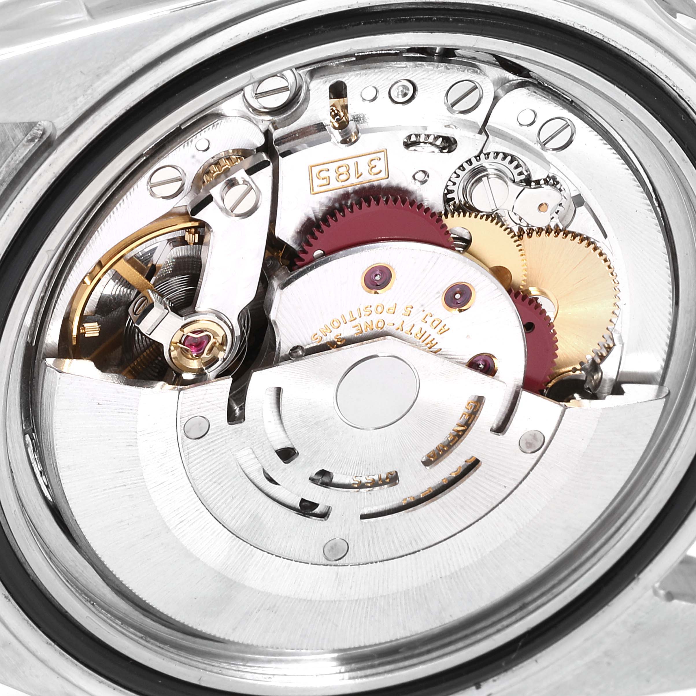 This close-up image shows the intricate movement and internal mechanics of a Rolex GMT-Master 16710 Men's Stainless Steel Black Dial 16710 Men's Stainless Steel Black Dial watch.