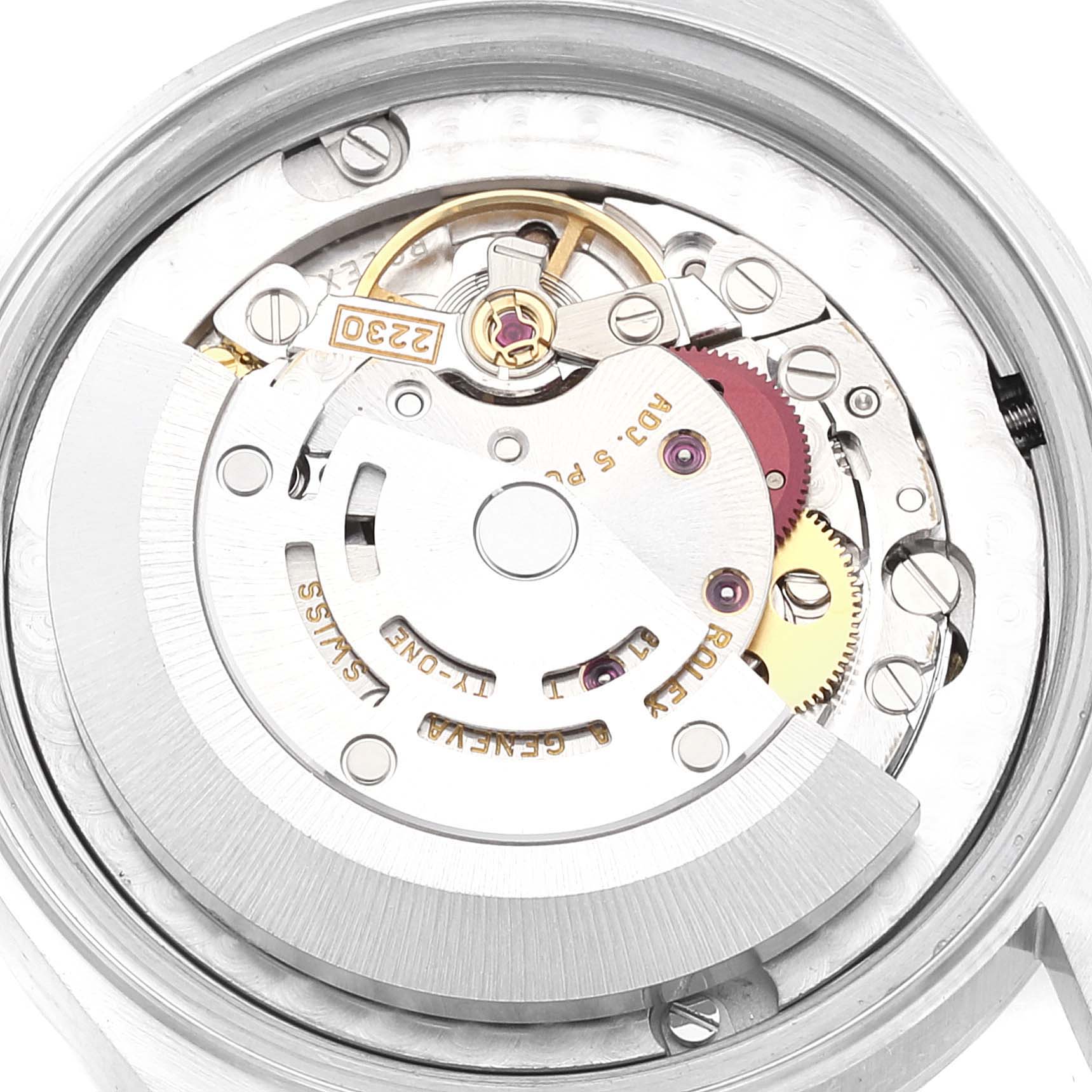 This image shows the internal mechanism of a Rolex Mid-Size 77080 Women
s Stainless Steel Pink Dial 77080 Women
s Stainless Steel Pink Dial model watch viewed from the back, highlighting the movement and rotor.