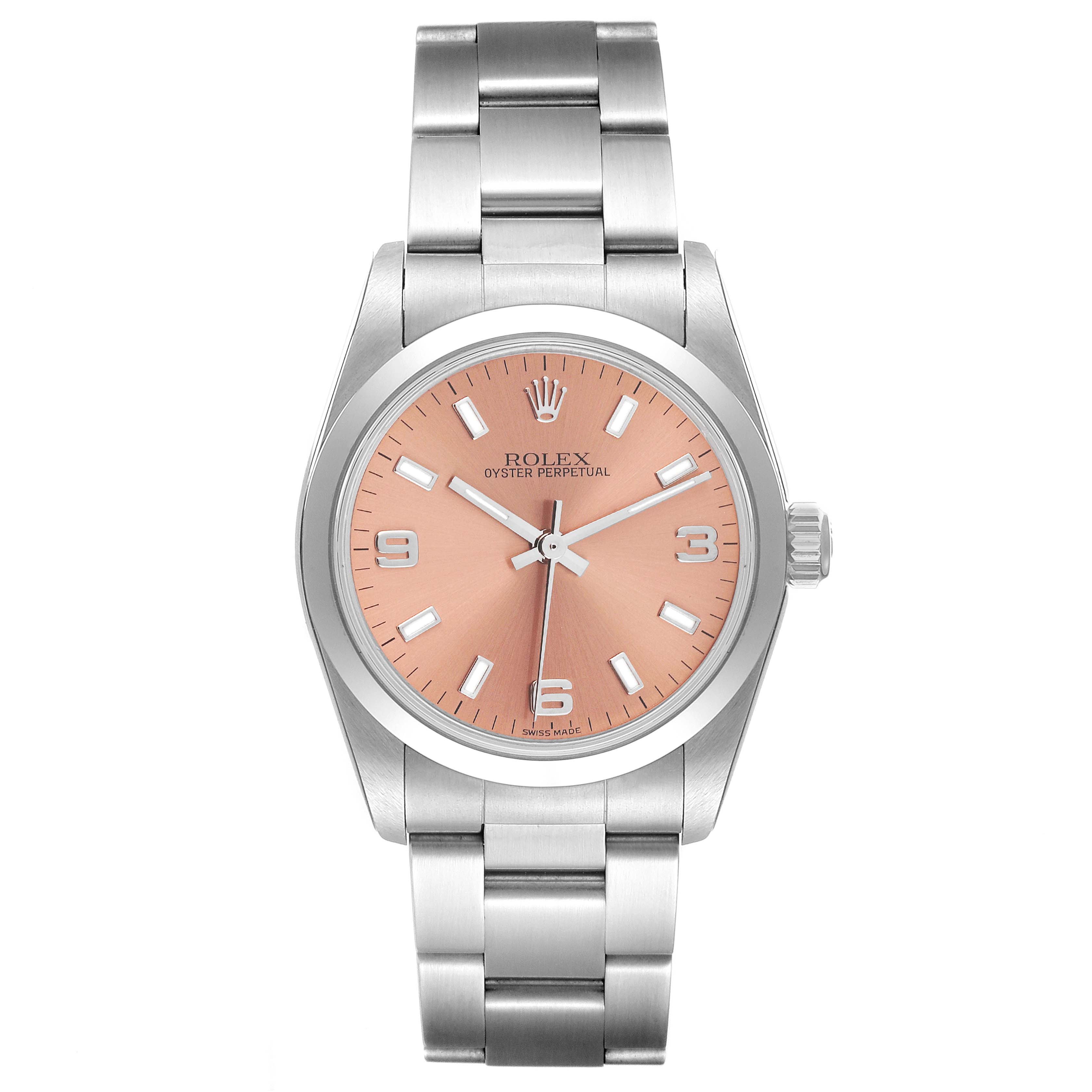 The image shows a front view of a Rolex Mid-Size 77080 Women
s Stainless Steel Pink Dial 77080 Women
s Stainless Steel Pink Dial Oyster Perpetual watch with a metal bracelet and a pink dial.